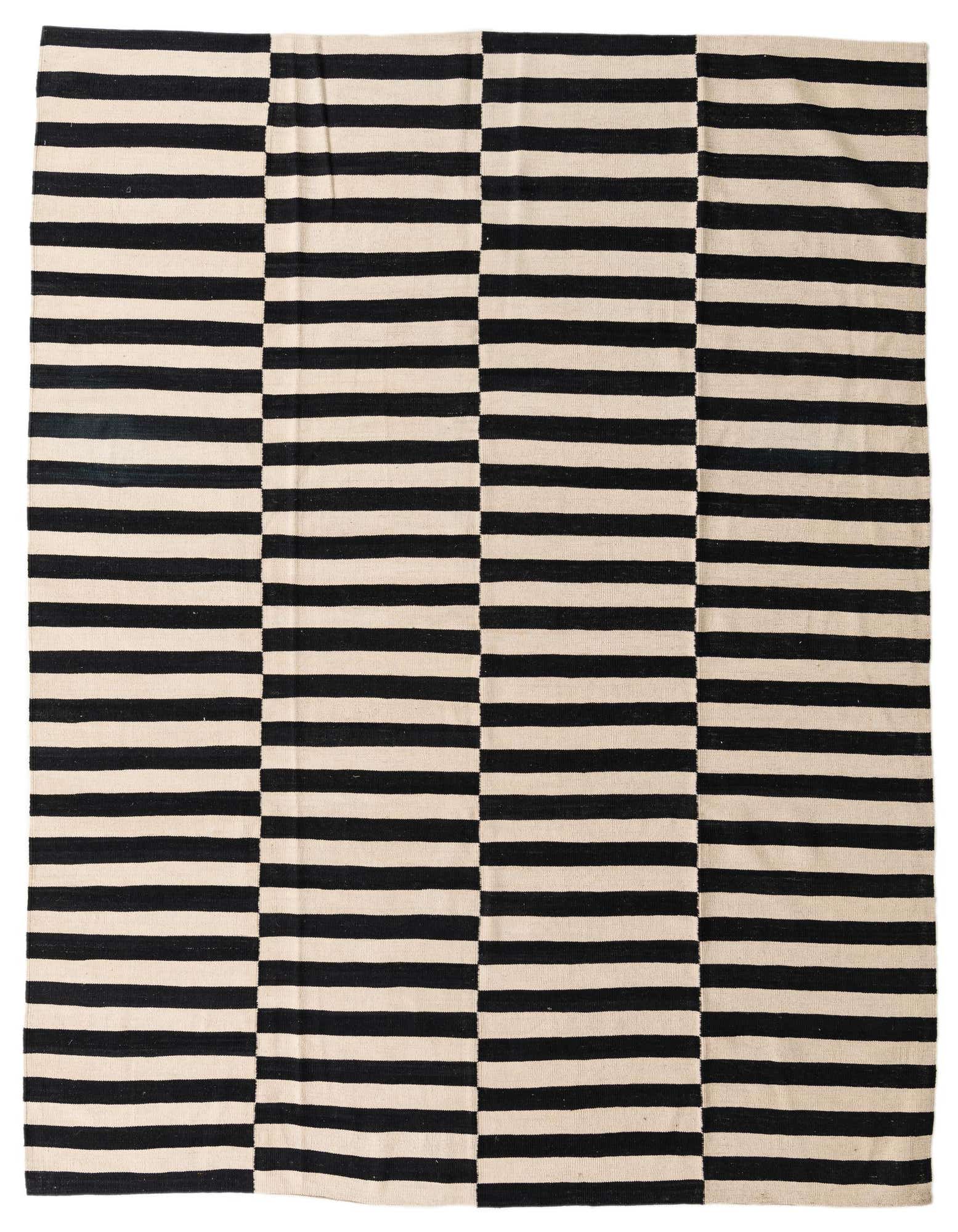 An 8x10 rectangular flatweave rug with alternating horizontal black and ivory stripes, creating a modern tribal pattern.