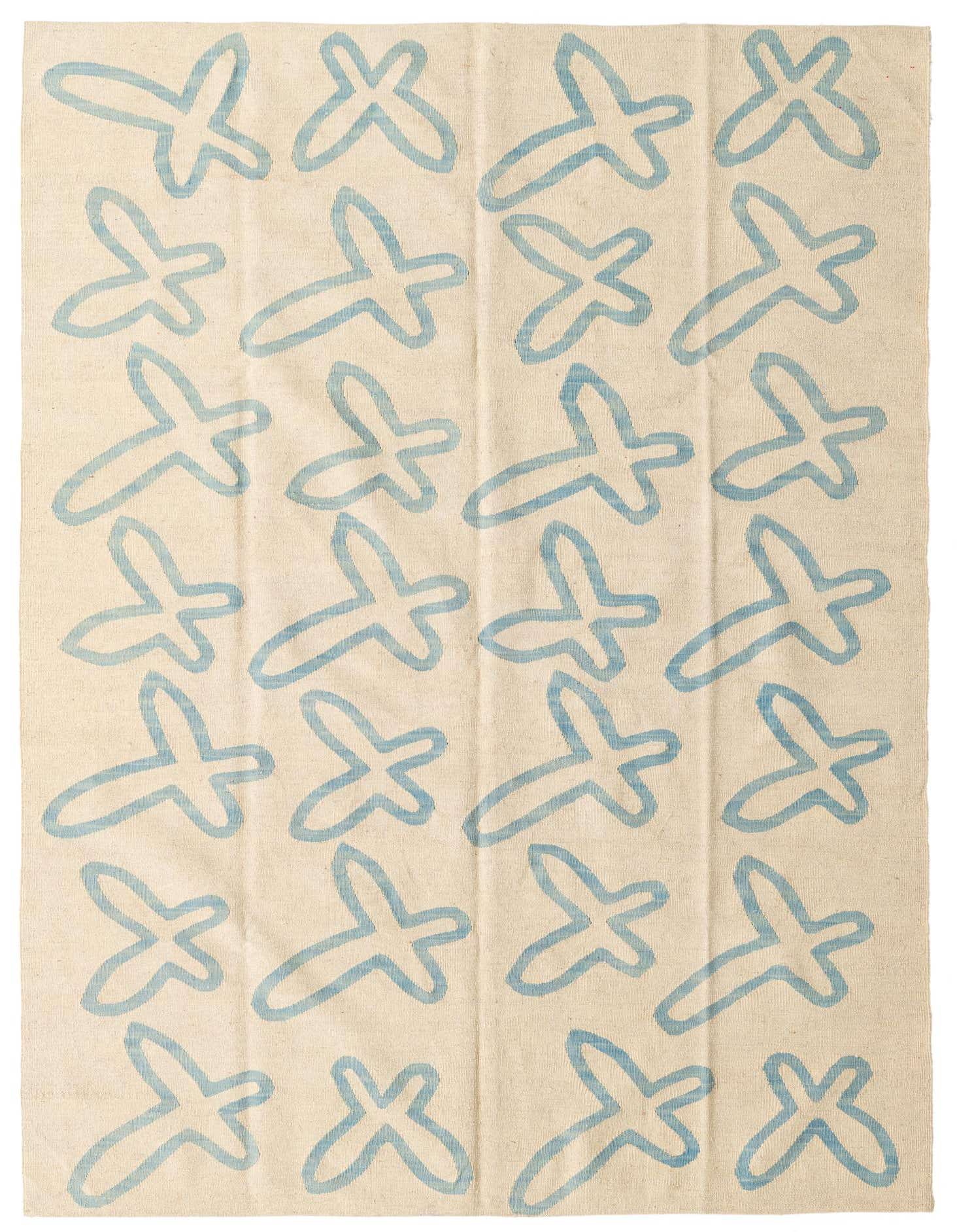 A 5x8 rectangular ivory flatweave rug with a repeating light blue abstract tribal pattern, suitable for a modern living room.