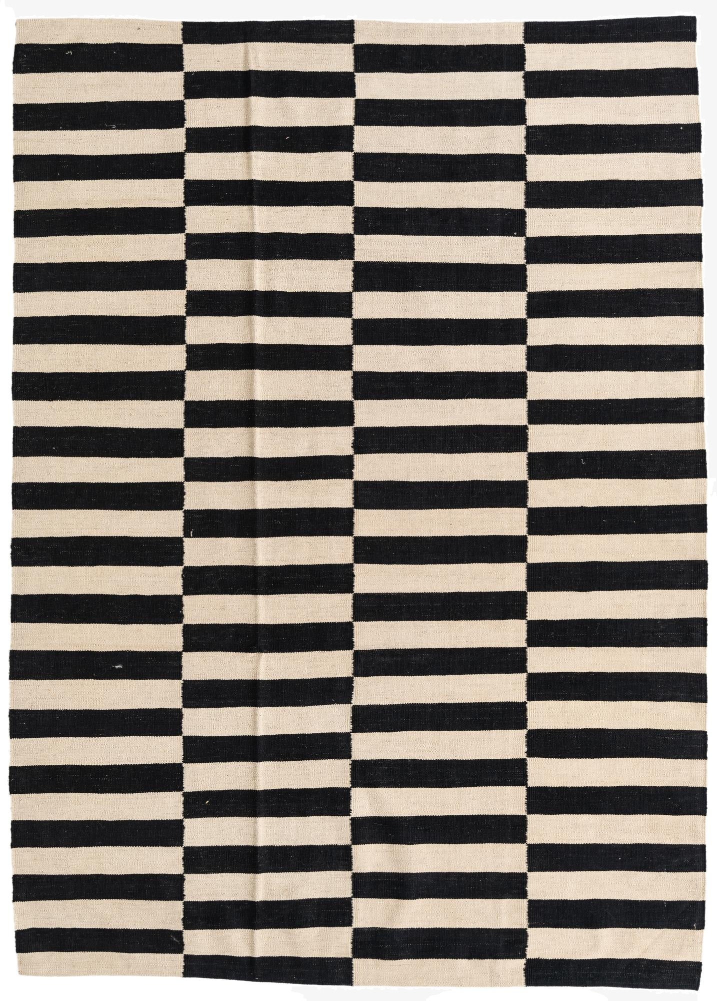 A 5x8 rectangular Kilim Modern rug with a bold black and ivory striped geometric pattern, ideal for a living room.
