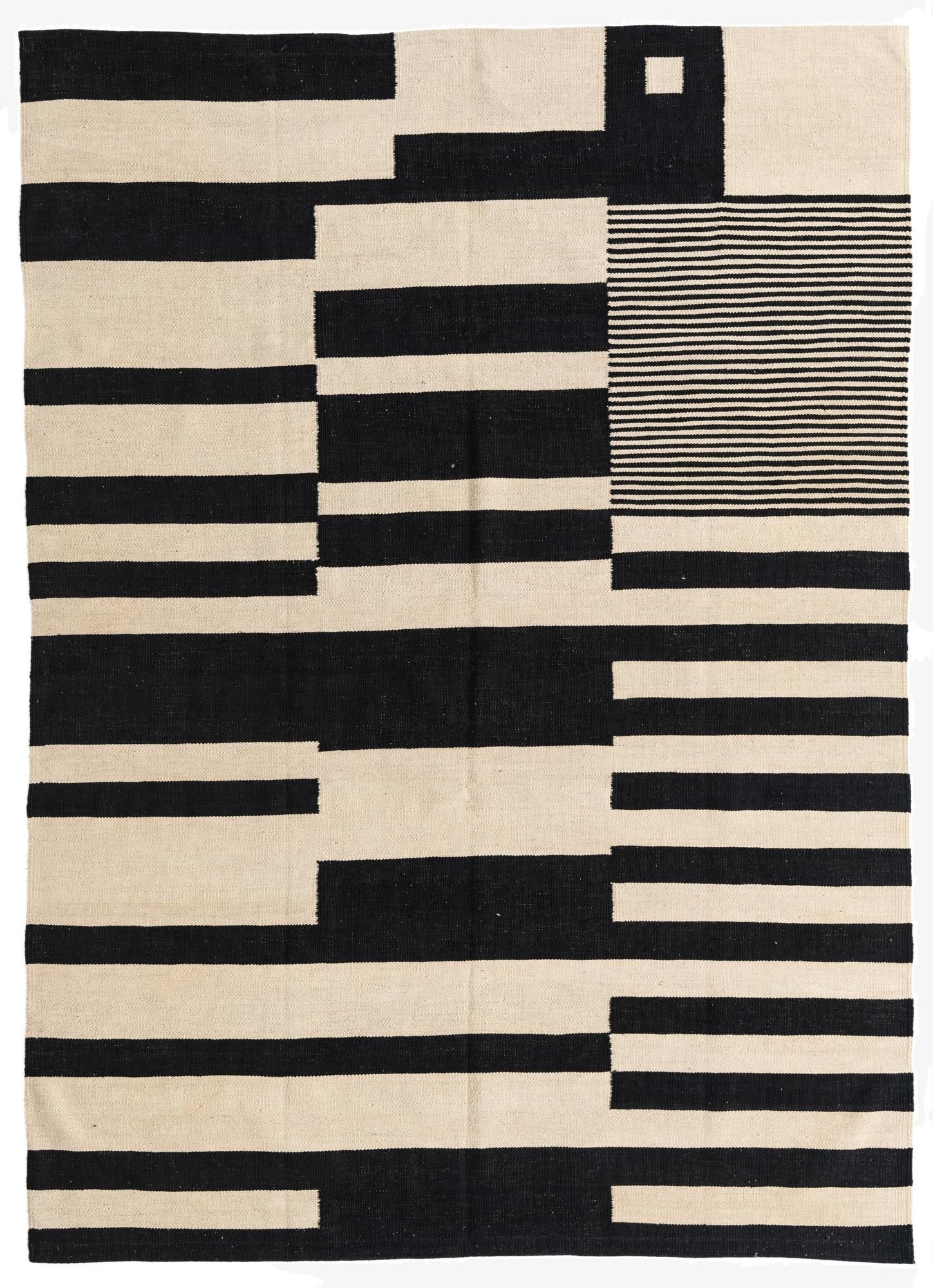A 5x8 rectangular Kilim Modern rug with a bold abstract pattern of black and ivory stripes and blocks.