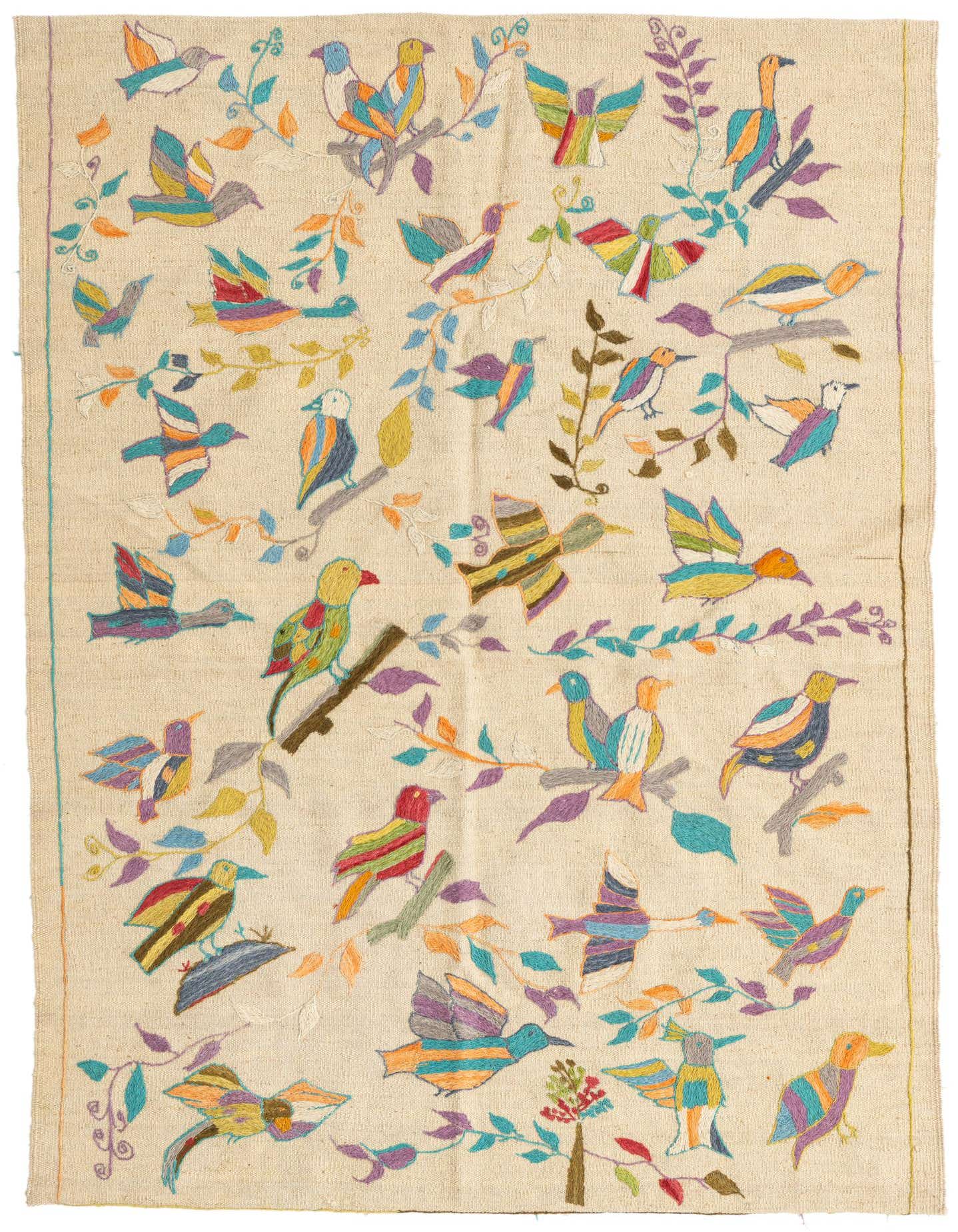 A 4x6 rectangular ivory flatweave rug featuring a vibrant, multicolored tribal bird and branch pattern, ideal for a living room.