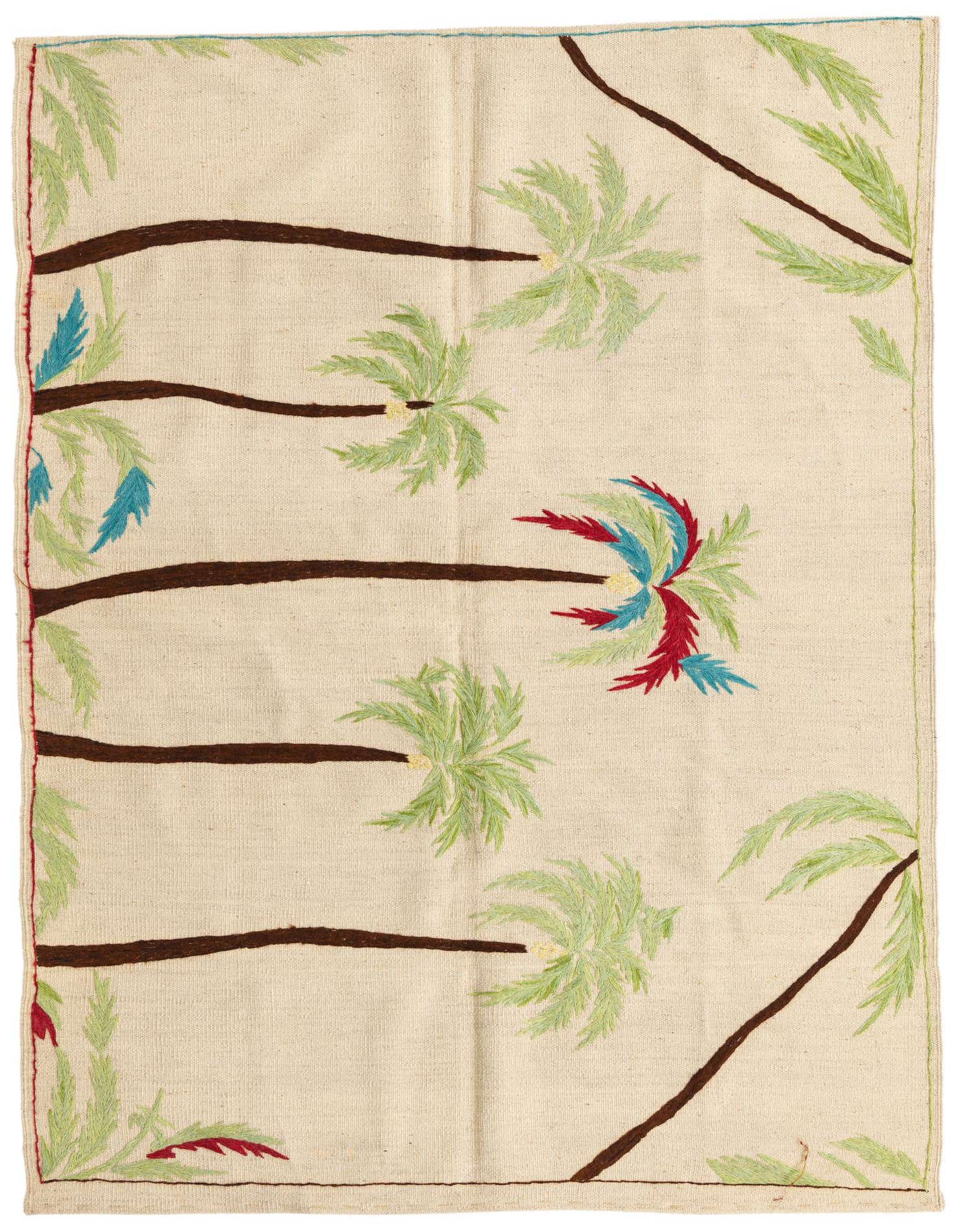 A 4x6 rectangular ivory flatweave rug with a tribal palm tree pattern in green, brown, red, and blue.