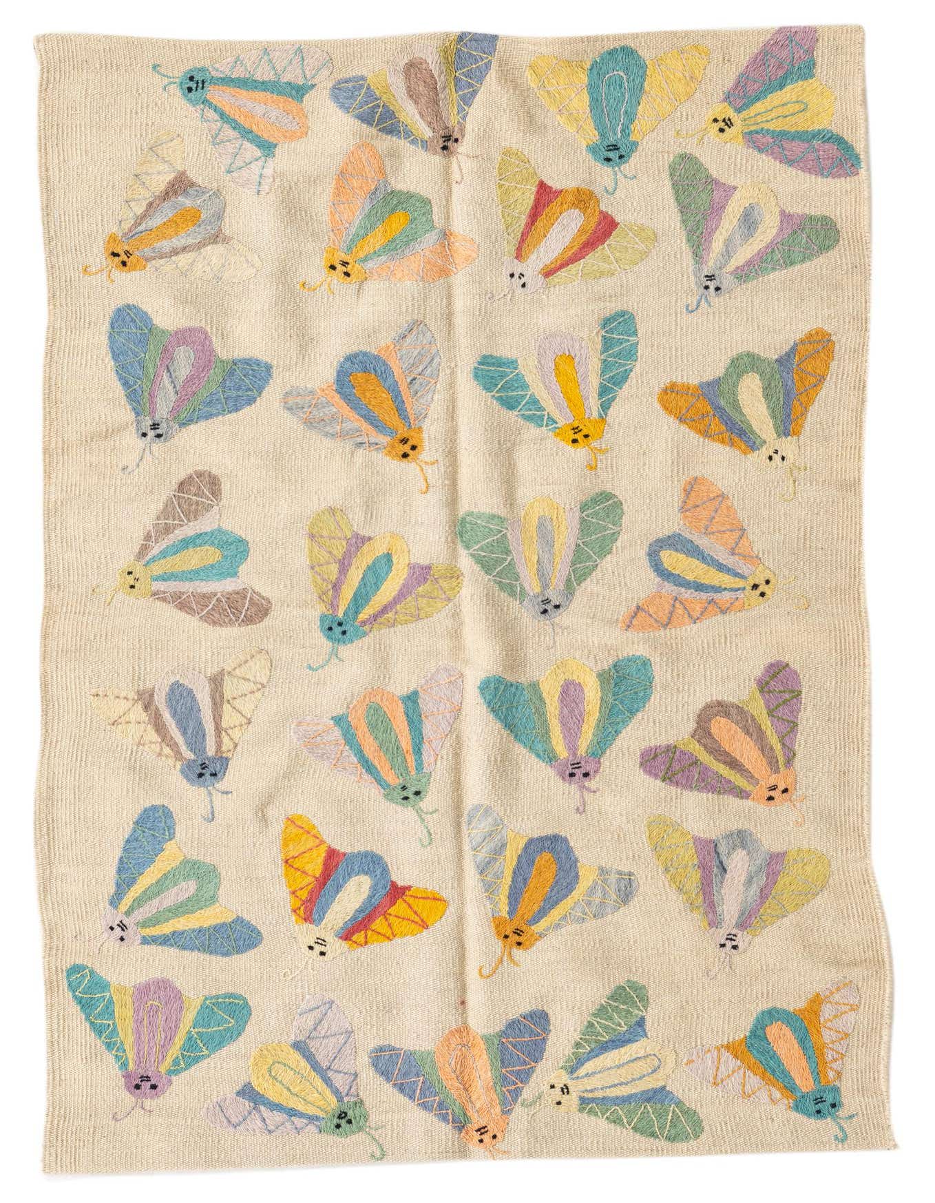 A 3x5 rectangular ivory flatweave rug featuring a pattern of colorful, stylized moths in various pastel shades.