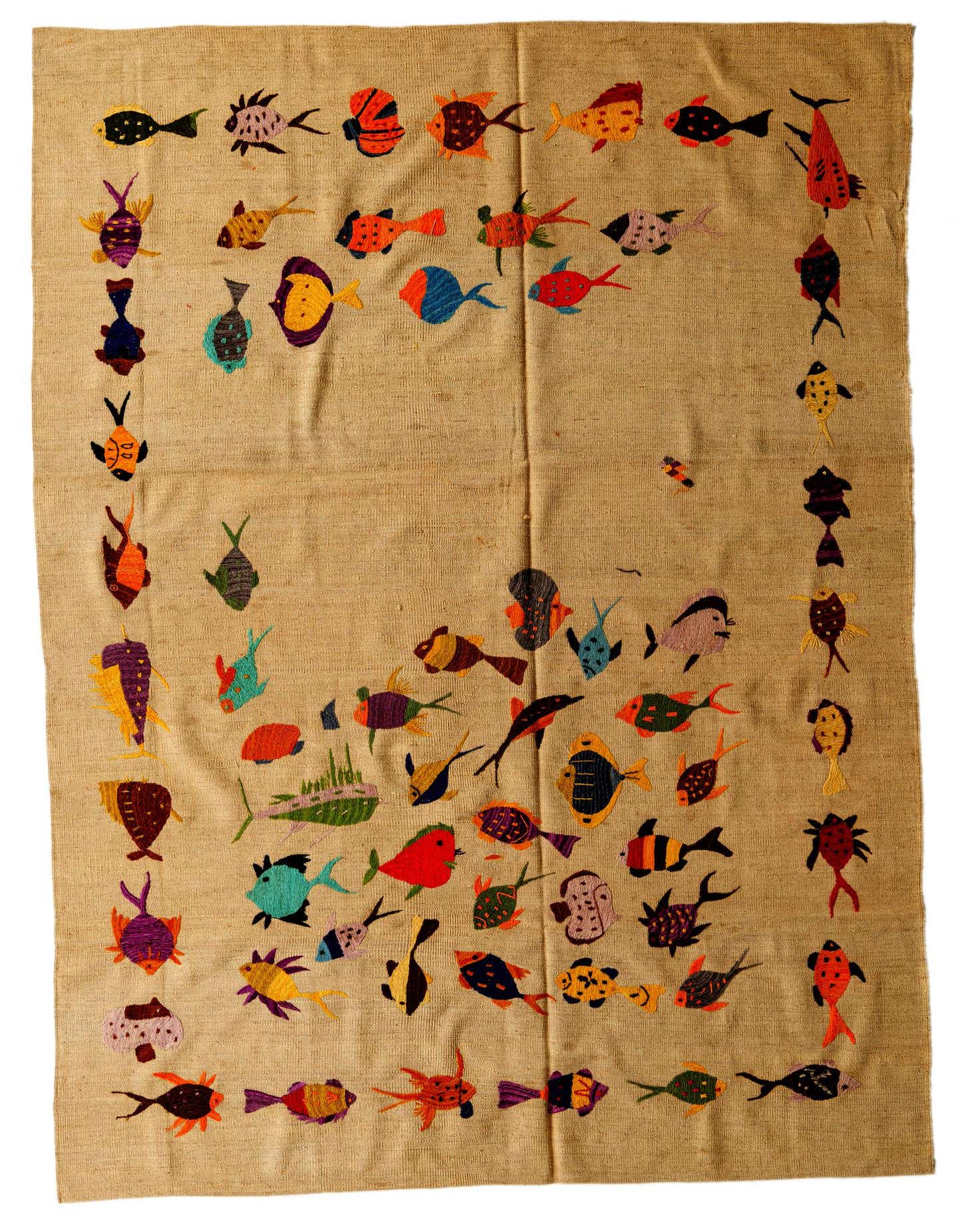 7x10 rectangular Kilim Suzani rug with a cream background and colorful embroidered fish patterns in various sizes and hues.