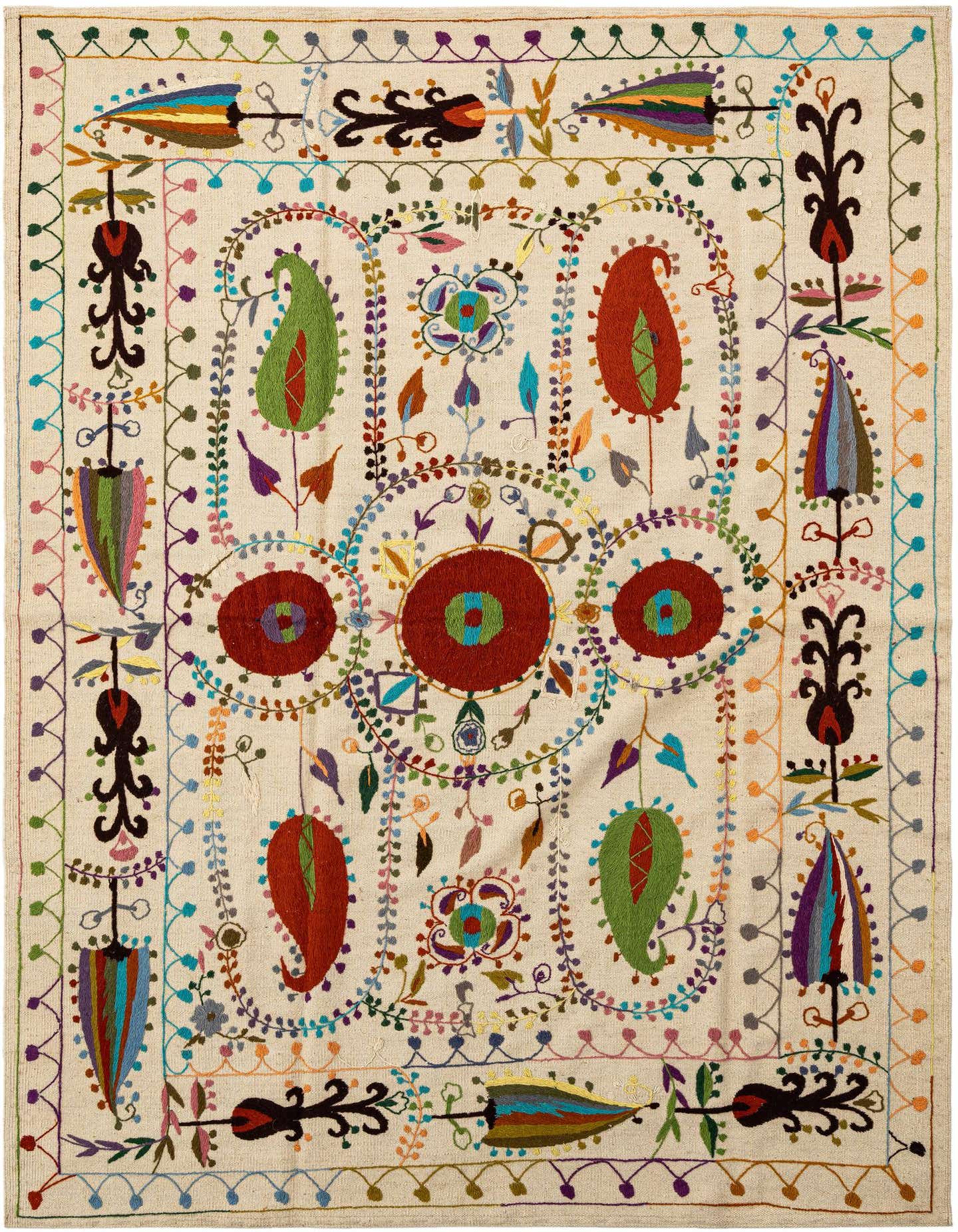 A rectangular ivory wool rug with a vibrant, intricate Persian tribal pattern featuring large red, green, and blue floral and paisley motifs.