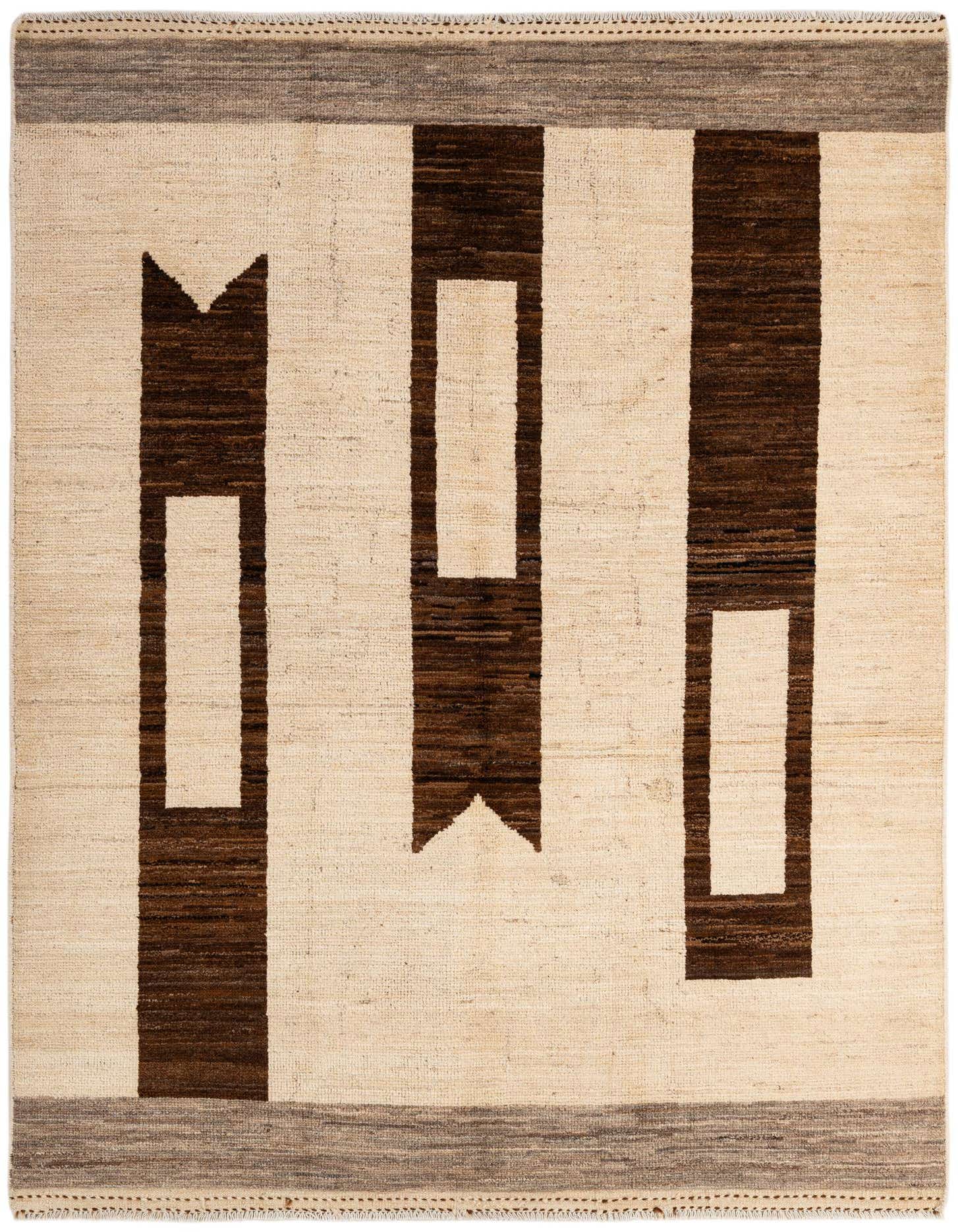 A 5x7 rectangular ivory wool rug with a modern tribal pattern of three dark brown abstract vertical shapes and a gray border.
