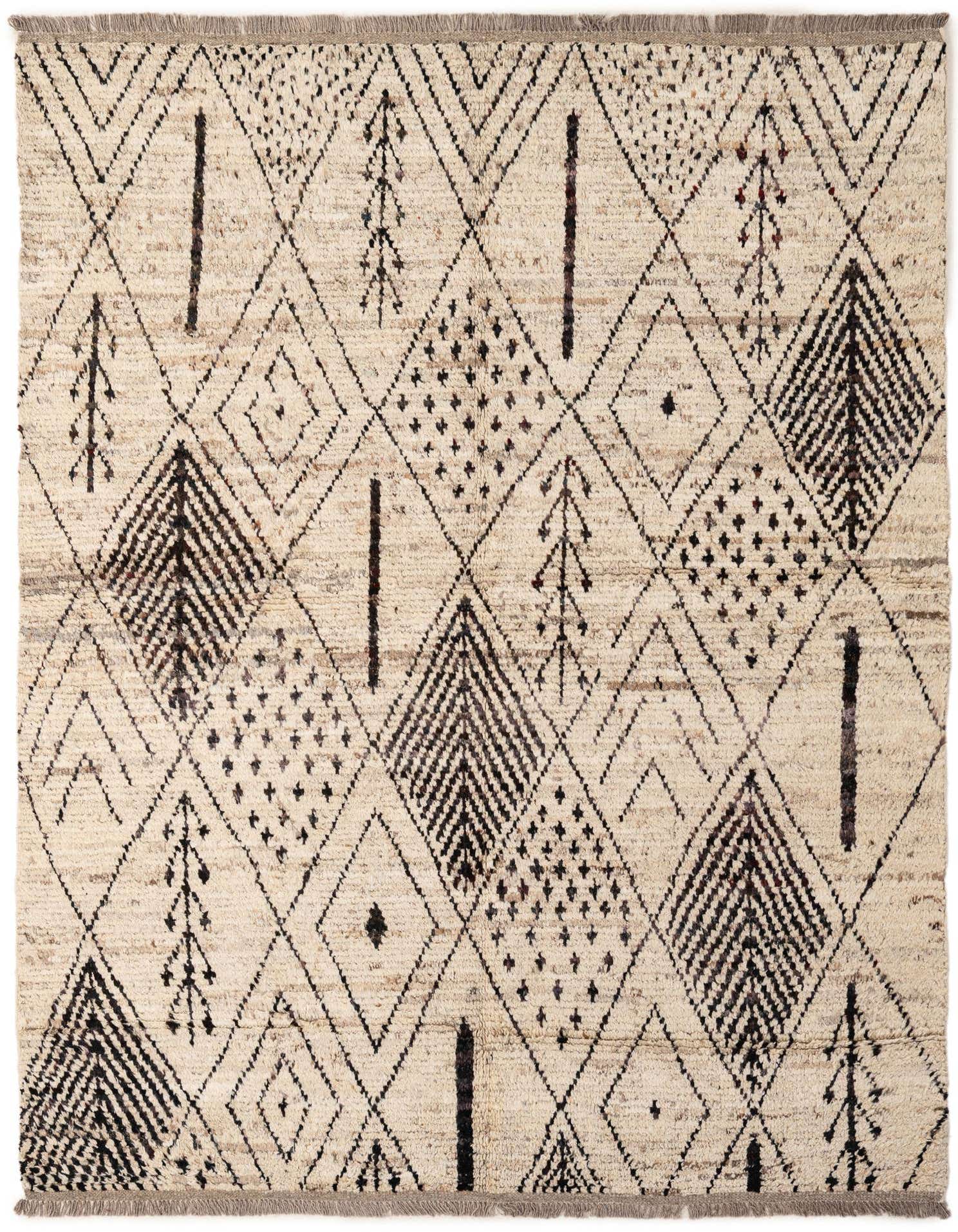 A 5x8 rectangular ivory wool rug with a tribal, modern pattern of black diamonds, trees, and dashed lines.