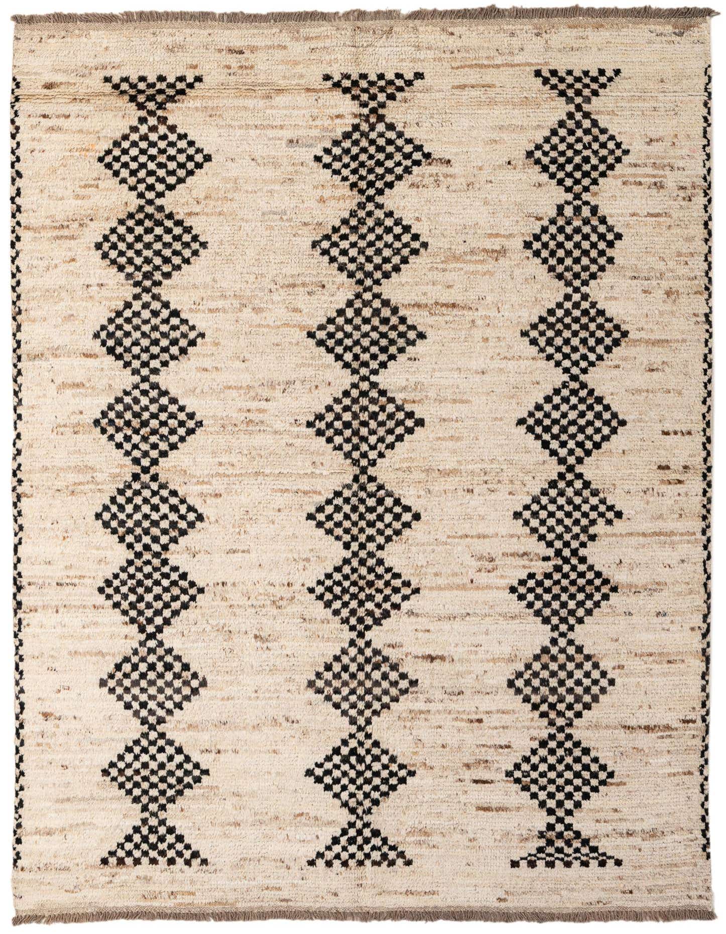 A 5x8 rectangular ivory wool rug with three vertical columns of black tribal diamond patterns, suitable for a living room.
