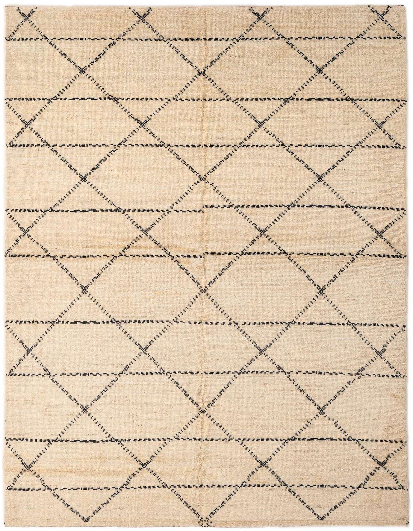 A 5x8 rectangular ivory wool rug with a black tribal diamond pattern, ideal for a living room or bedroom.