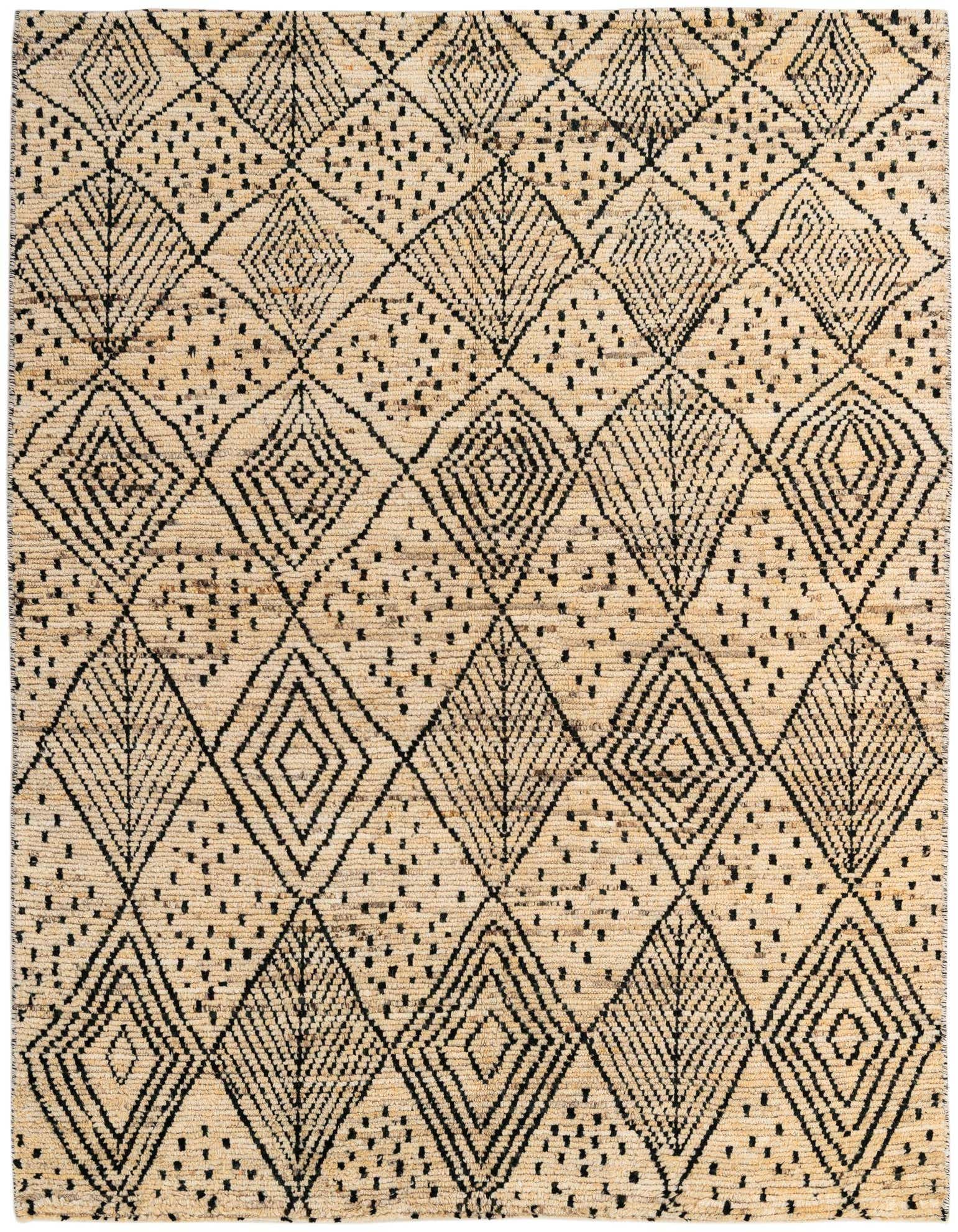 A 5x8 rectangular ivory wool rug with a black tribal diamond and dot pattern, perfect for a living room.
