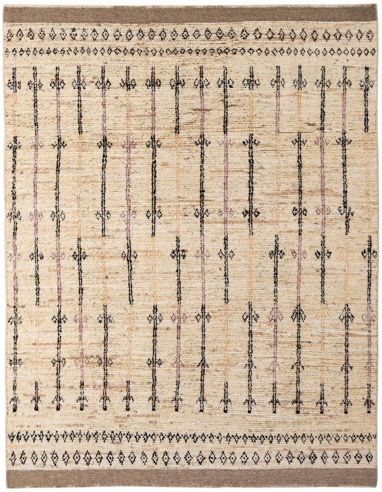 A 6x9 rectangular ivory wool rug with a tribal pattern of black, purple, and gold vertical lines and geometric motifs, suitable for a living room.