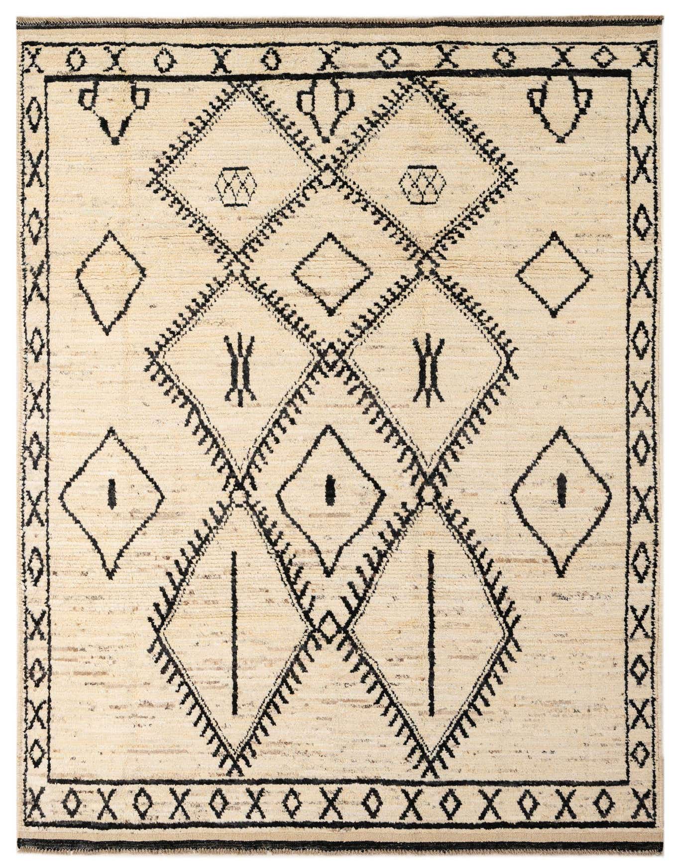 A 6x9 rectangular ivory wool rug with a black tribal geometric pattern and border, suitable for a living room.