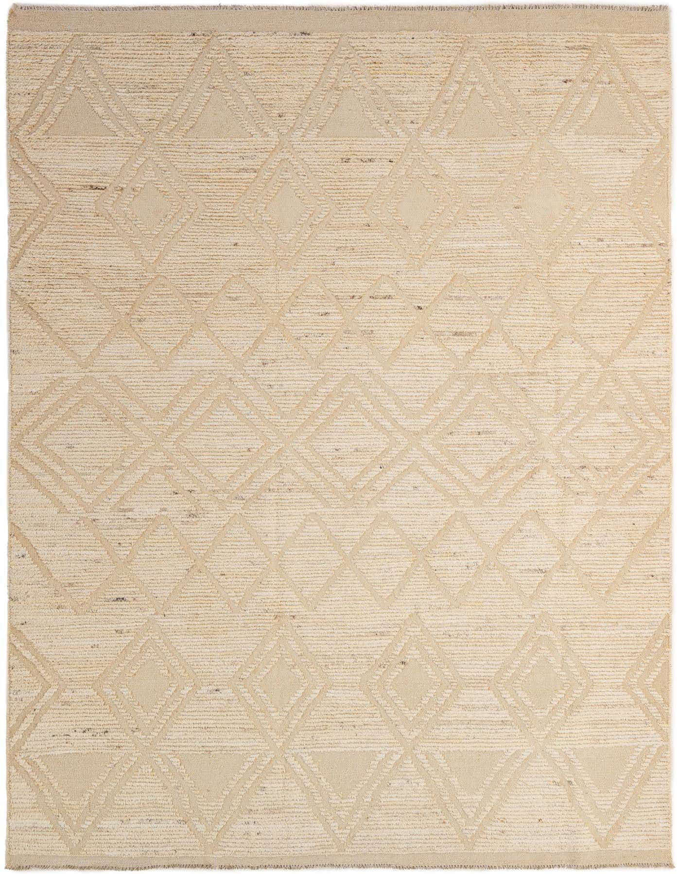 A 6x9 rectangular ivory wool rug with a raised tribal geometric pattern, perfect for a living room.