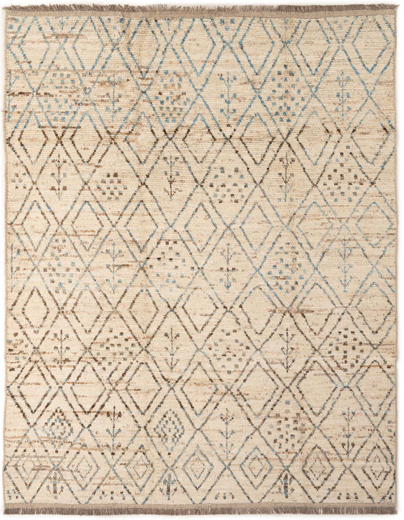 A 6x9 rectangular ivory wool rug with a tribal modern pattern of blue and brown diamonds and abstract motifs.