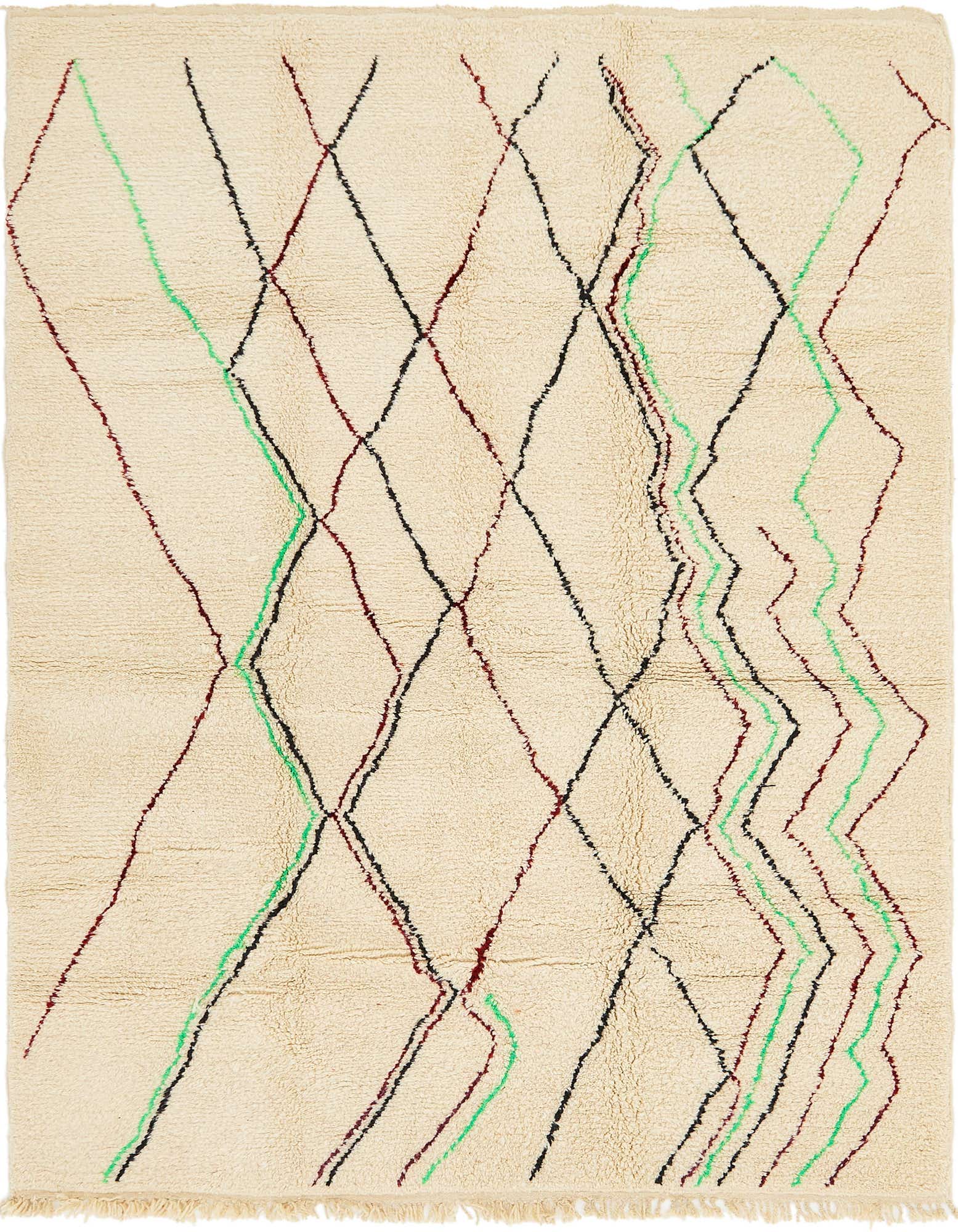 A 7x10 rectangular ivory shag rug with a modern Southwestern pattern of black, red, and green abstract lines and diamonds.