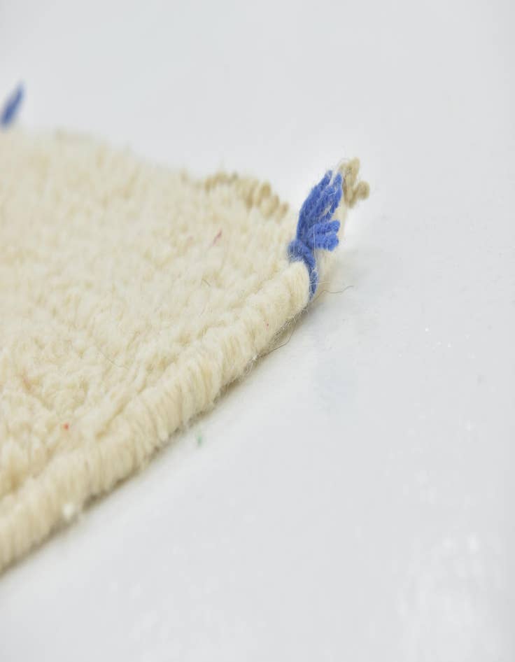 Detail image of  6' 10 x 9' 10  Hand Knotted Moroccan Wool Rug