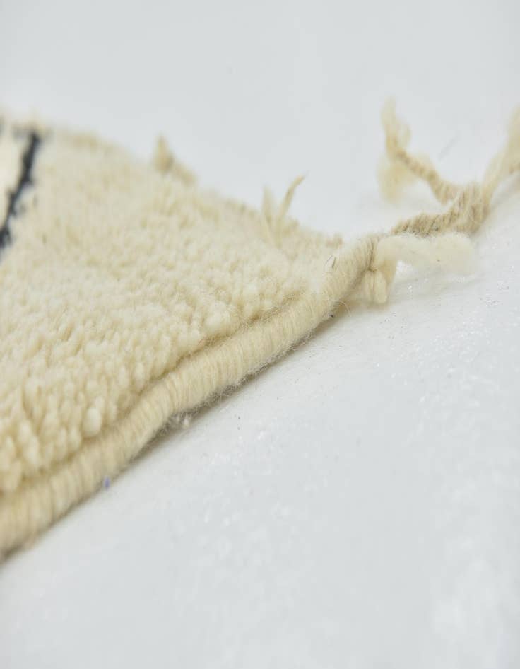 Detail image of  4' 10 x 8' 5  Hand Knotted Moroccan Wool Rug