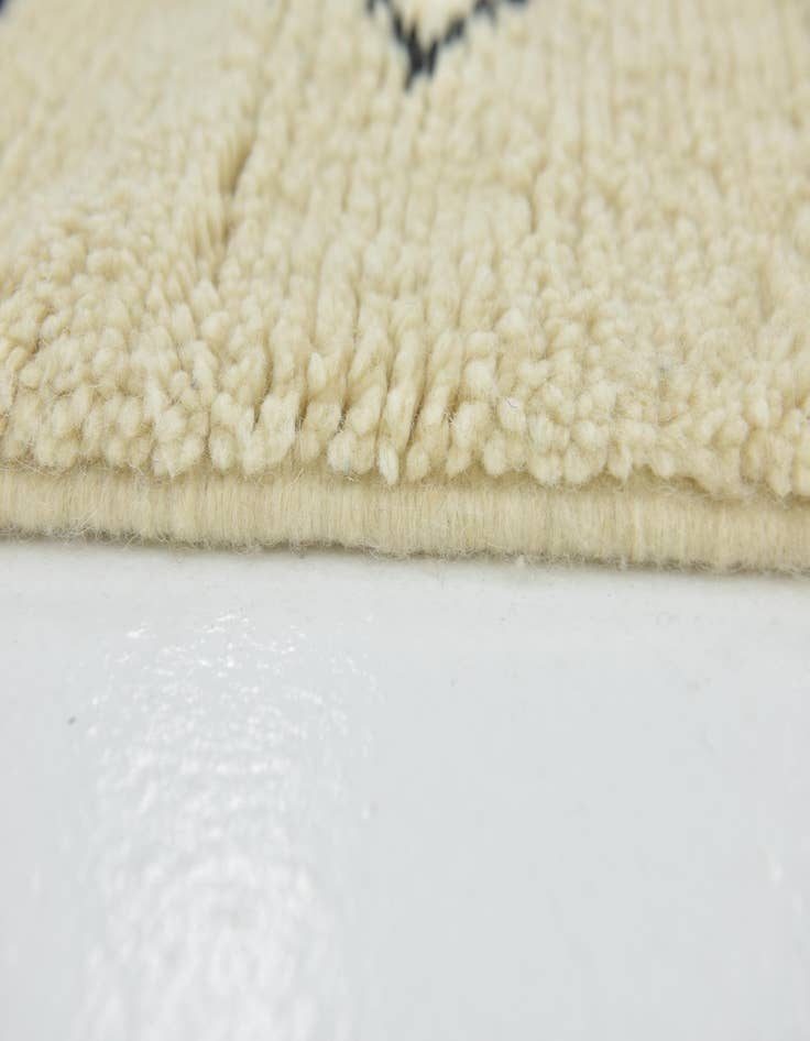 Detail image of  4' 10 x 8' 5  Hand Knotted Moroccan Wool Rug