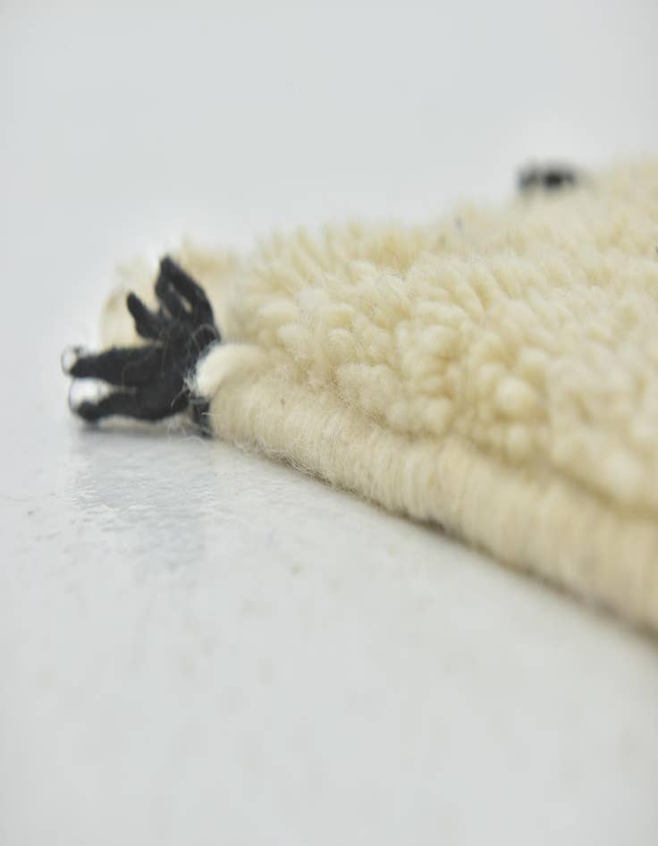 Detail image of  4' 9 x 8' 2  Hand Knotted Moroccan Wool Rug