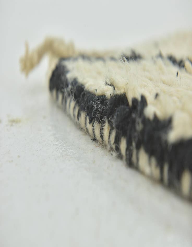 Detail image of  6' 6 x 9'  Hand Knotted Moroccan Wool Rug