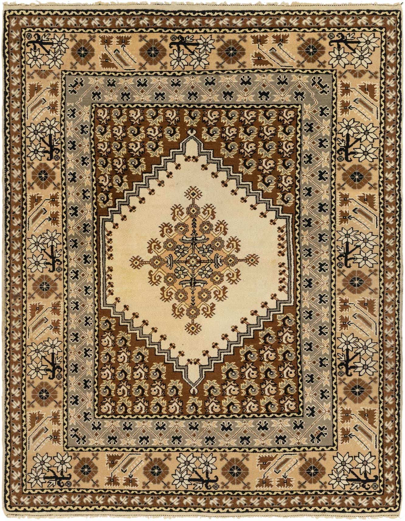 A 7x10 rectangular ivory and brown Southwestern rug with a central medallion and tribal patterns, ideal for a living room.