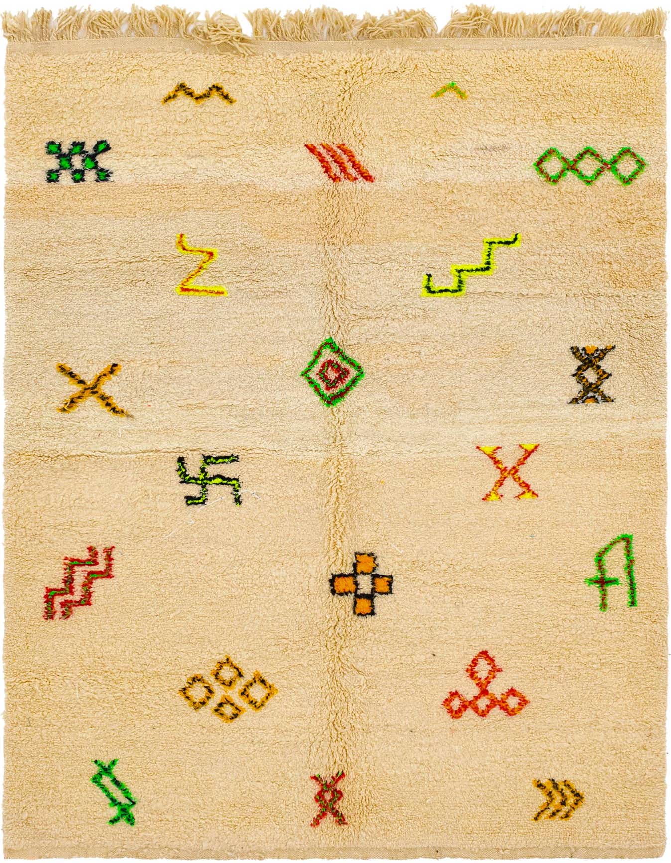 A 5x8 rectangular ivory shag rug with colorful abstract and tribal symbols scattered across its surface.