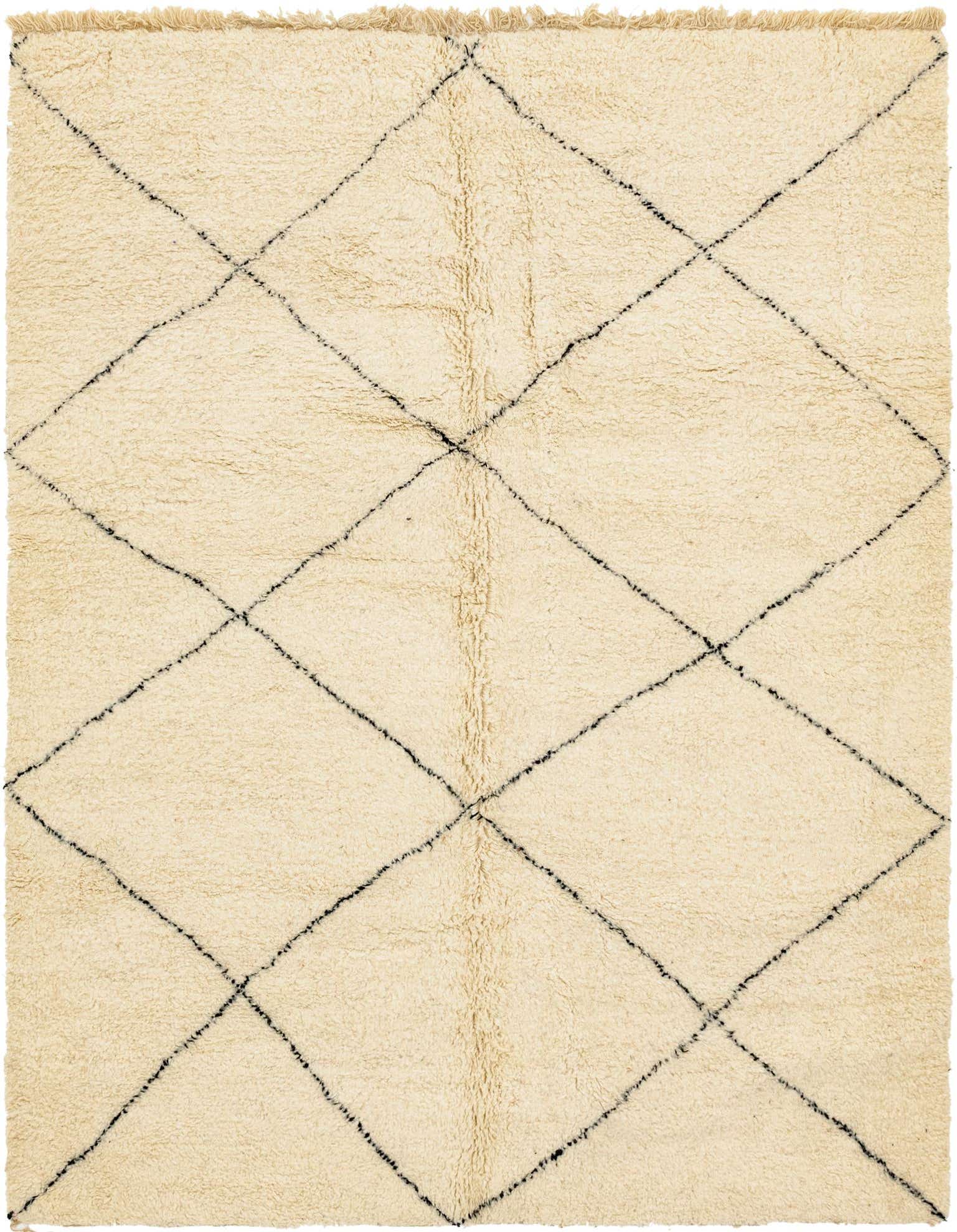 A 7x10 rectangular ivory shag rug with a black tribal diamond pattern, ideal for a living room.
