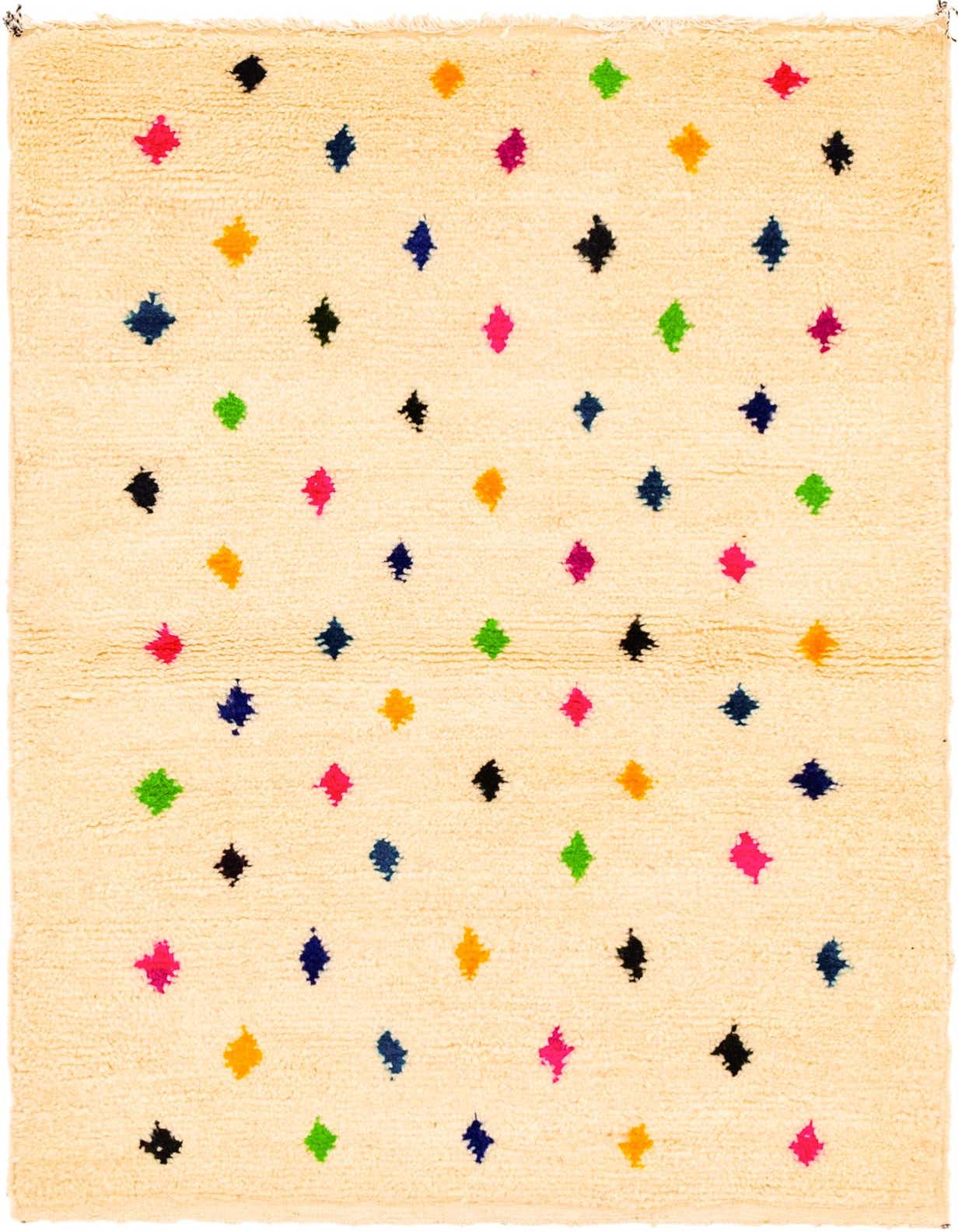 A 3x5 rectangular ivory shag rug with colorful tribal diamond patterns in pink, blue, green, black, and orange.