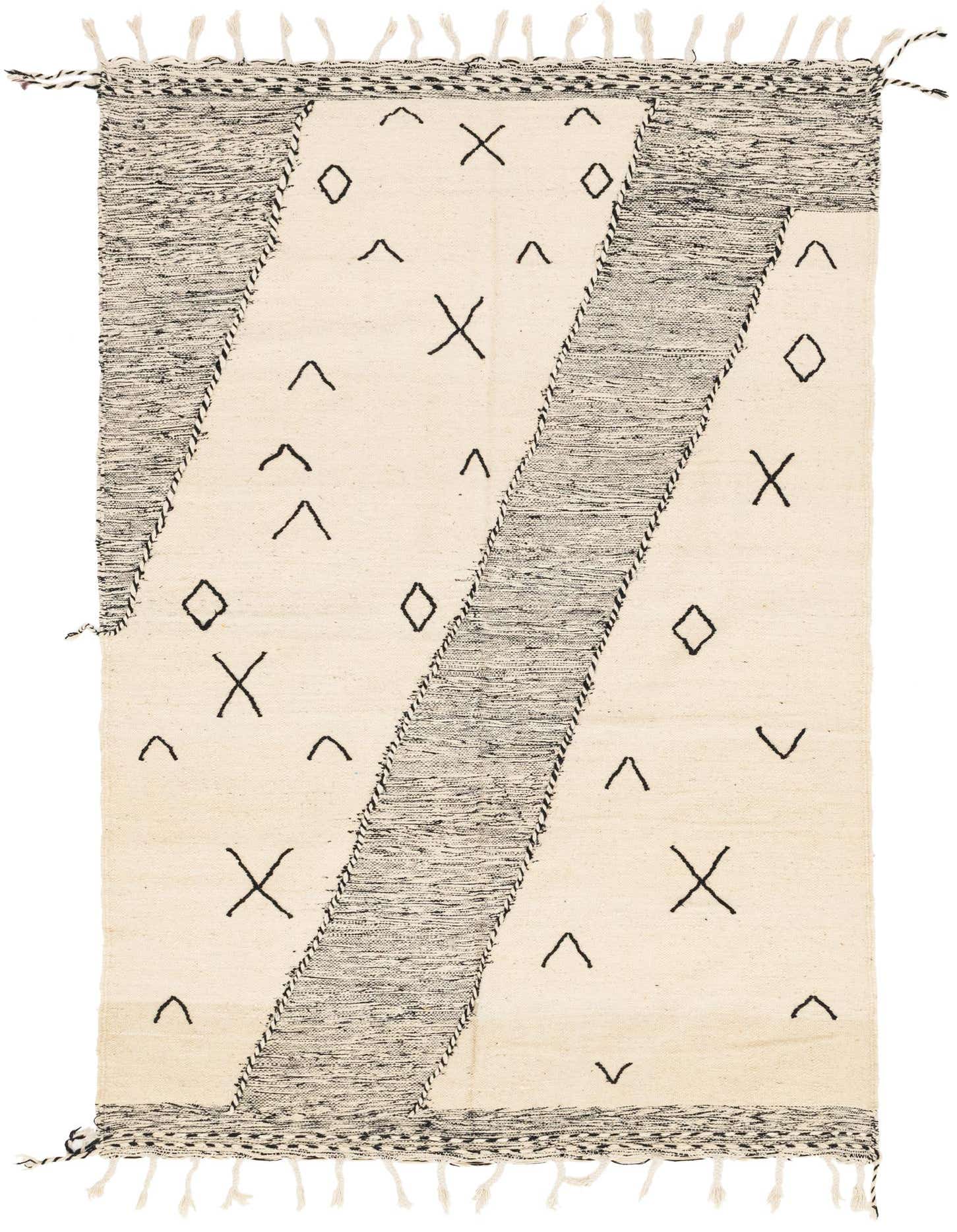 A 6x9 rectangular ivory and black tribal shag rug with abstract X and diamond patterns, featuring diagonal black stripes.
