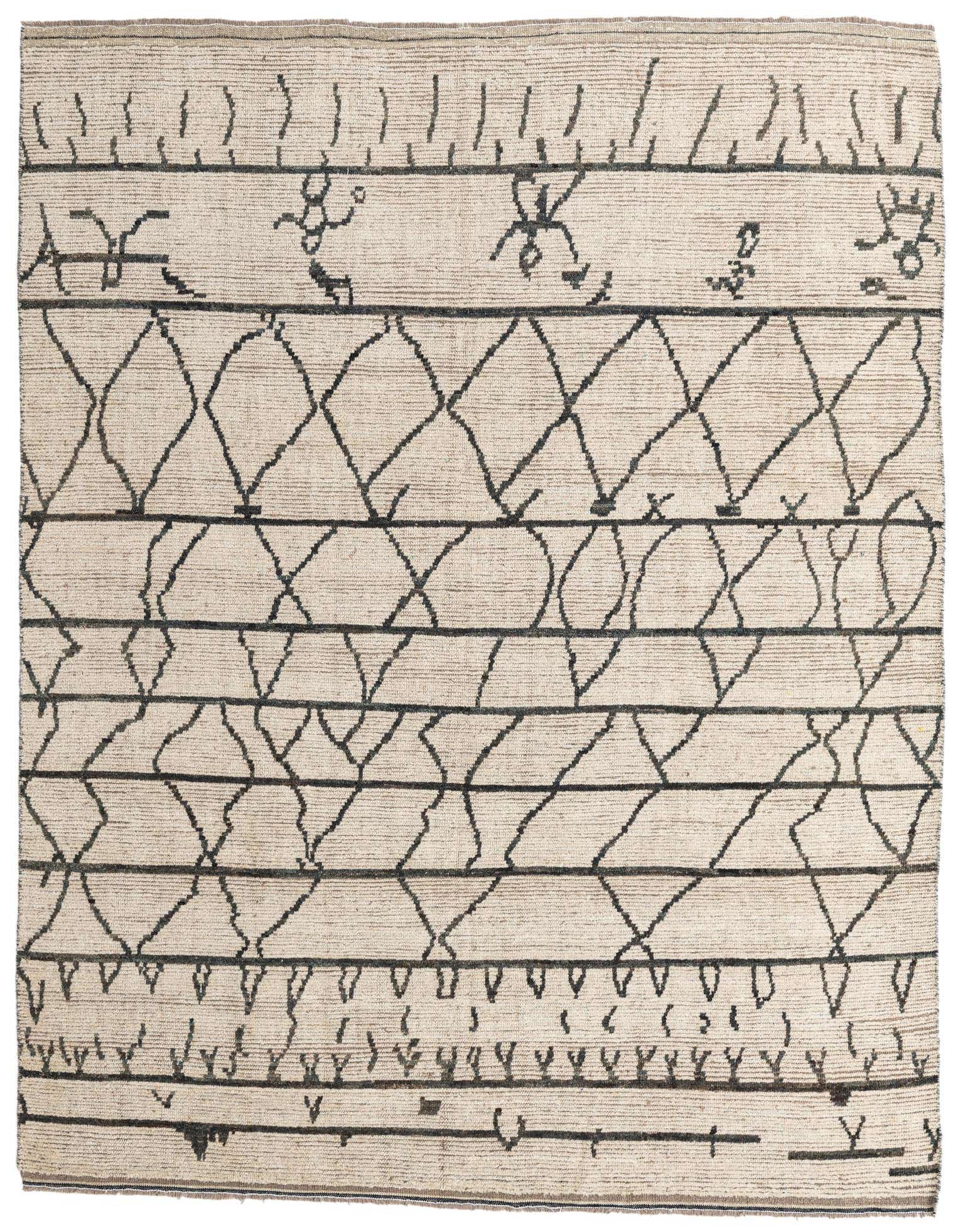 An 8x10 rectangular ivory shag rug featuring a modern tribal pattern with abstract black lines and geometric diamonds.