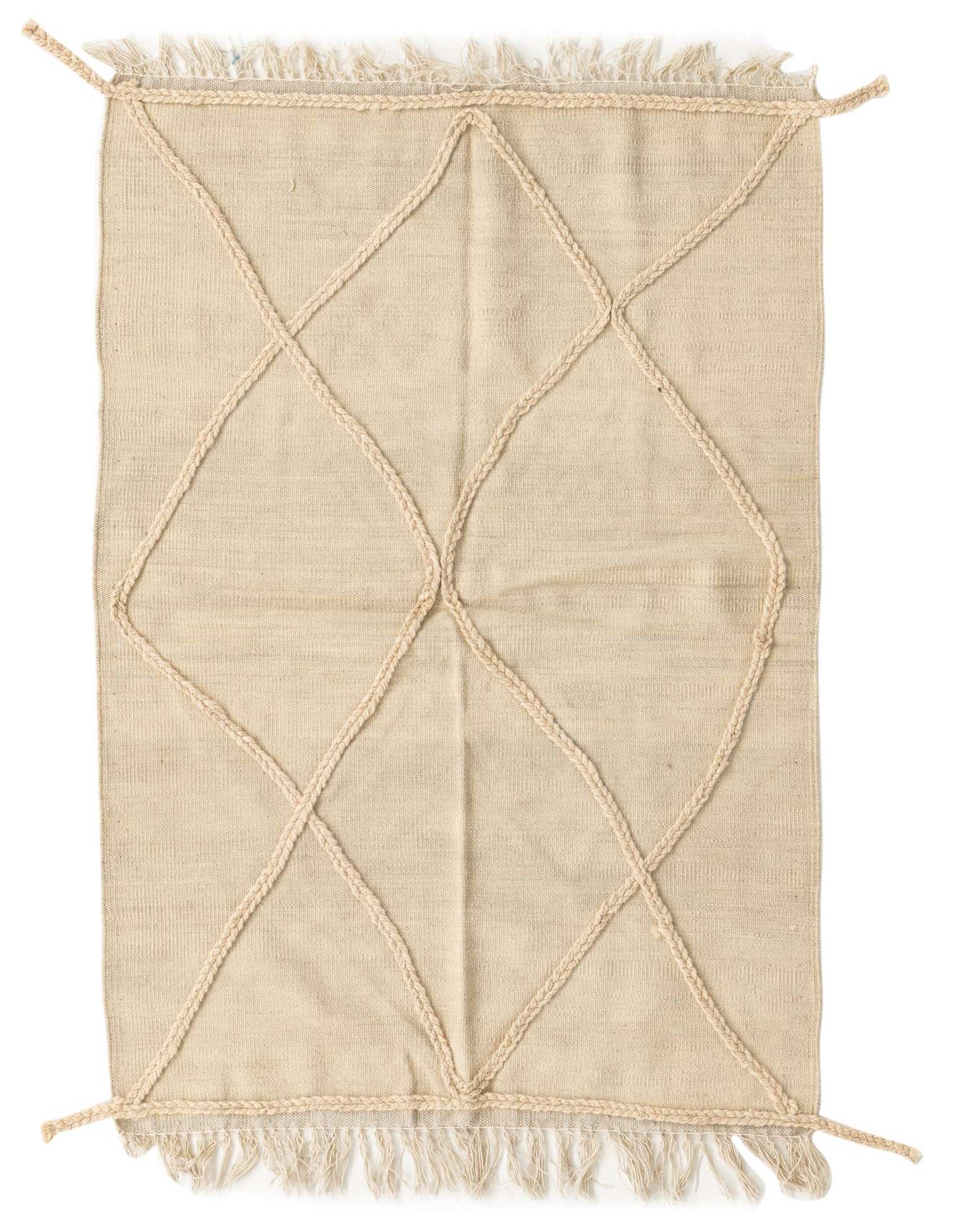 A 3x5 rectangular ivory wool shag rug with a braided diamond tribal pattern and fringe edges, suitable for indoor use.
