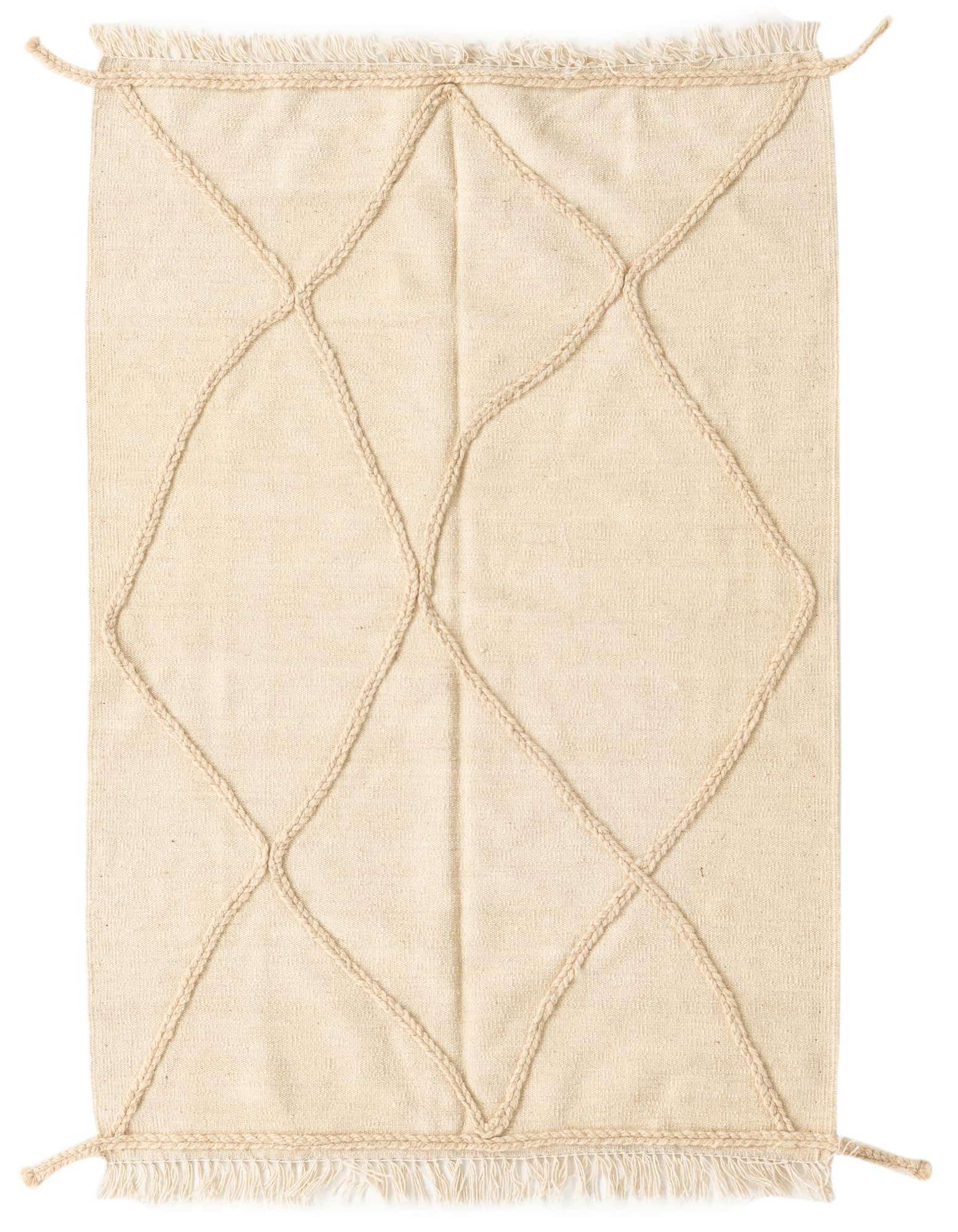A 3x5 rectangular ivory wool shag rug with a raised braided tribal diamond pattern and fringed edges.