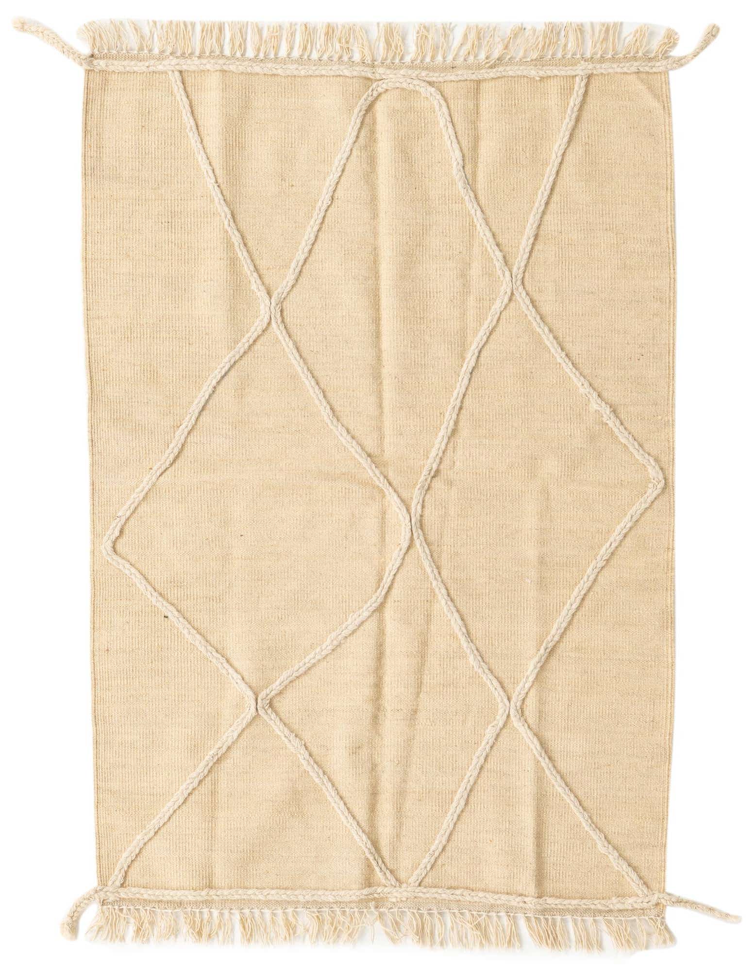 A 3x5 rectangular ivory wool shag rug with a braided cream diamond pattern and fringed ends.