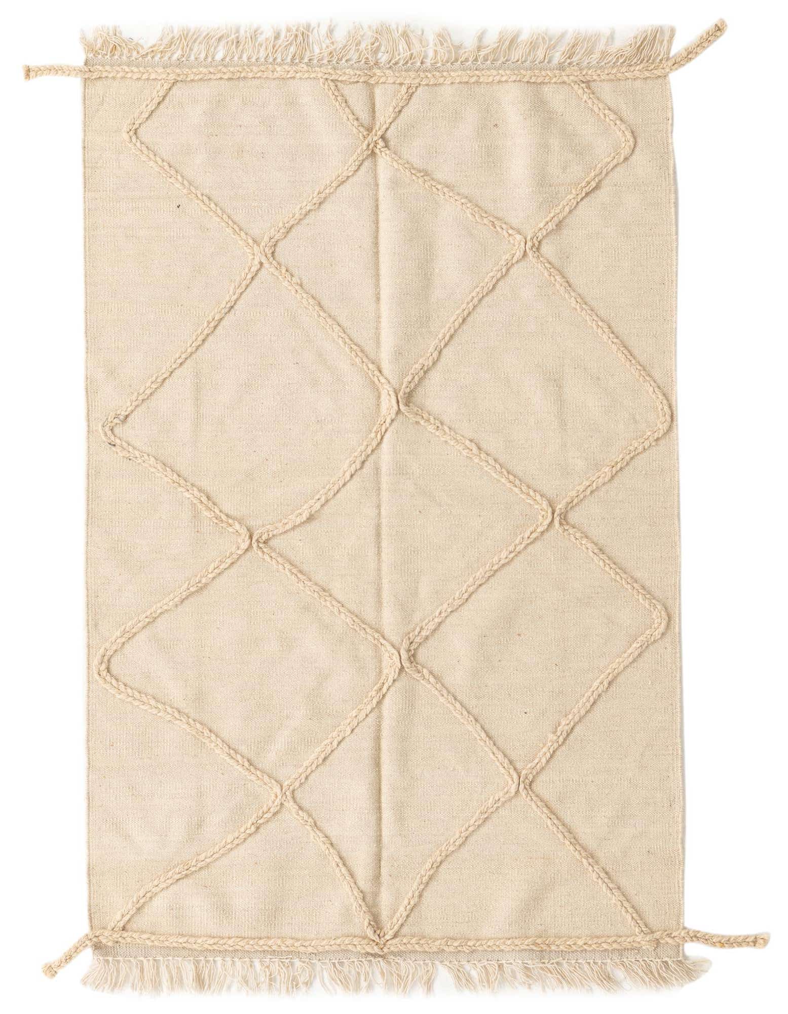 A 3x5 rectangular ivory wool shag rug with a raised braided diamond pattern and fringed edges.
