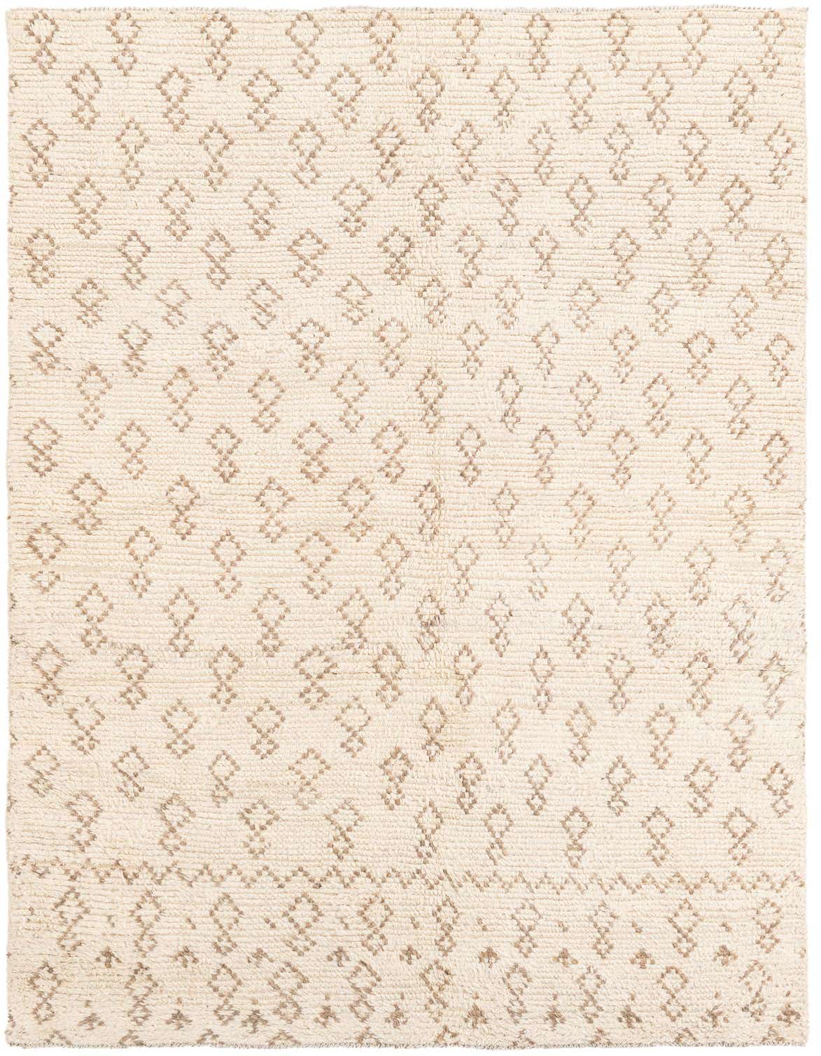 A 5x8 rectangular ivory shag rug with a repeating pattern of light brown tribal diamond shapes.