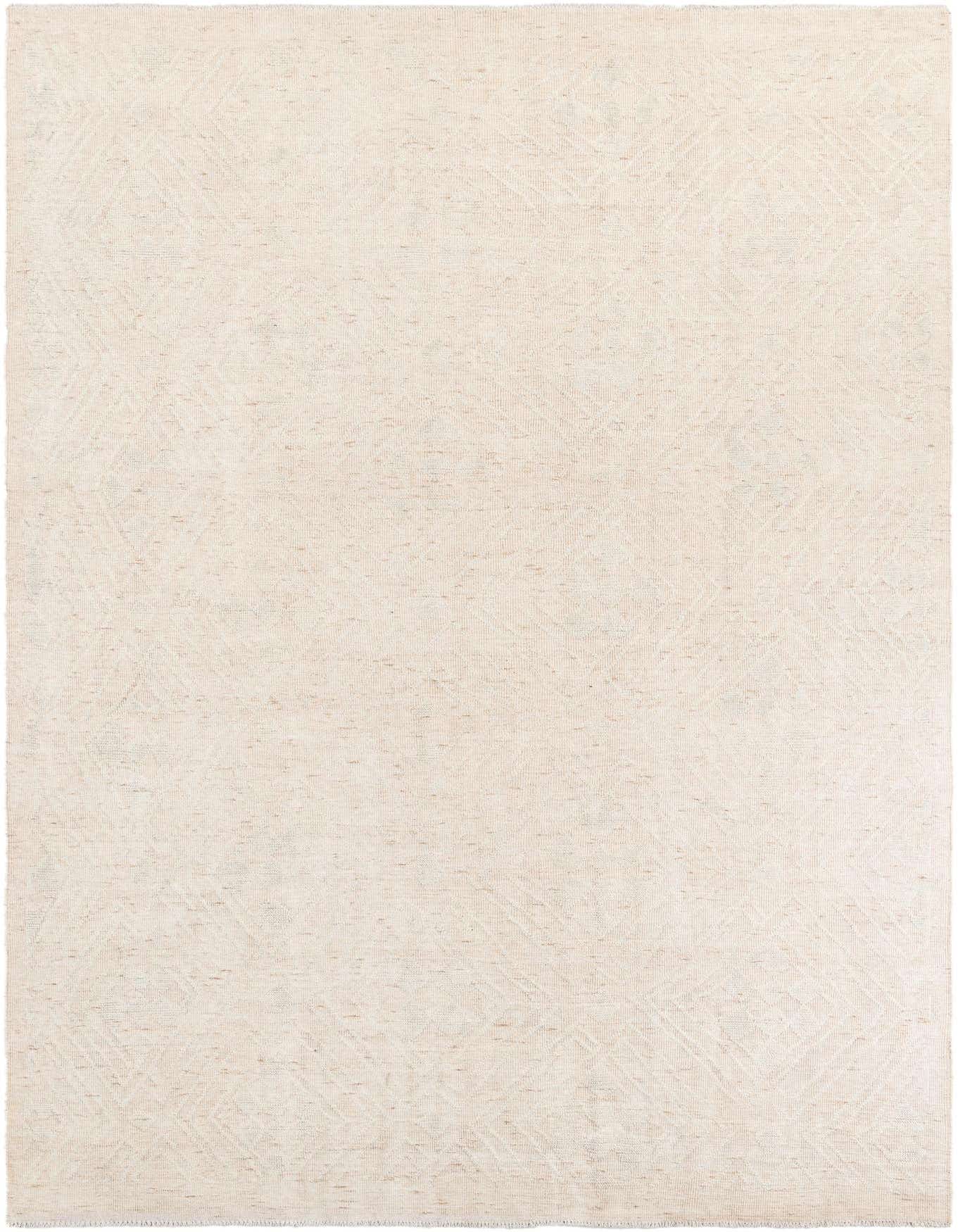 A 9x12 rectangular ivory wool shag rug with a subtle tribal pattern, ideal for a living room.