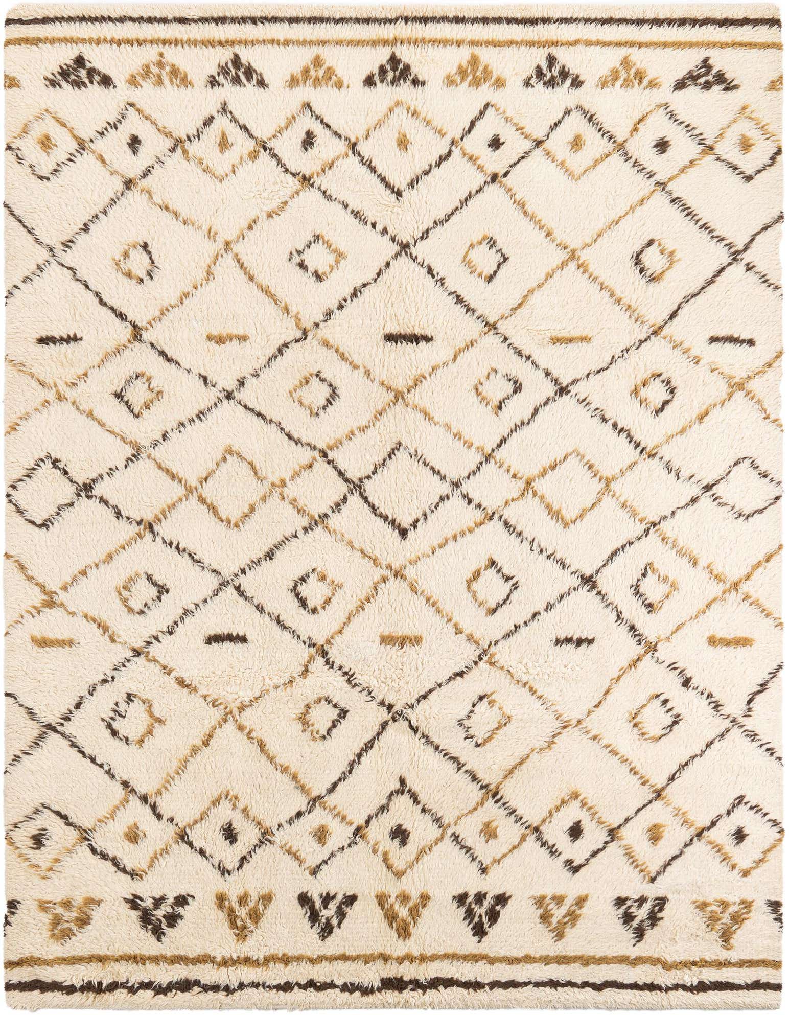 An 8x10 rectangular ivory shag rug with a tribal geometric pattern in brown and tan, perfect for a living room.