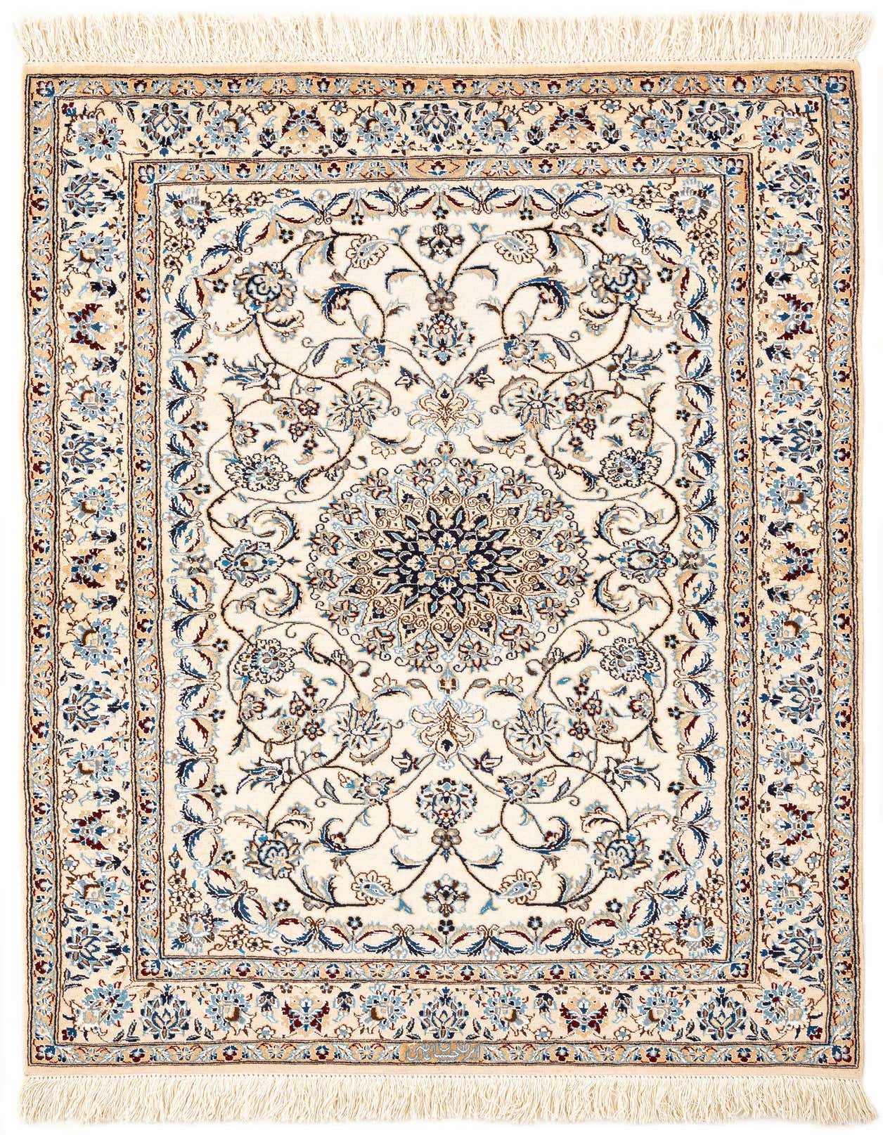 A rectangular handmade Persian rug in ivory with intricate blue and brown floral patterns and a central medallion.
