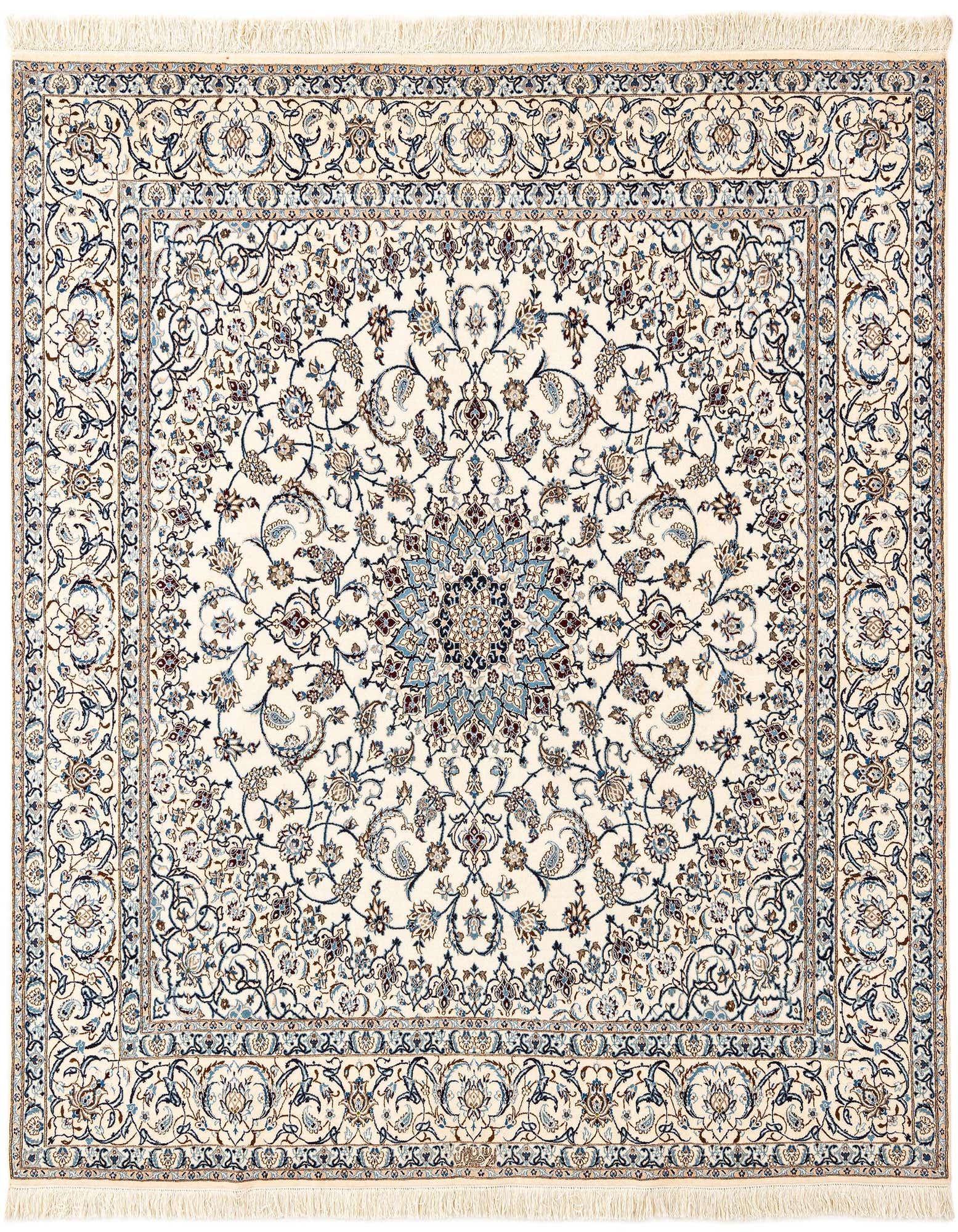Handmade rectangular Persian rug in ivory and cream with intricate blue and brown floral medallion patterns and fringe.