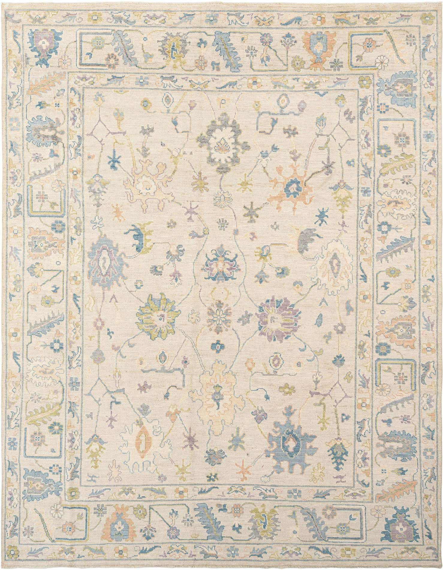A rectangular Oushak Persian wool rug in ivory with a border and intricate floral patterns in muted blues, greens, and peaches.