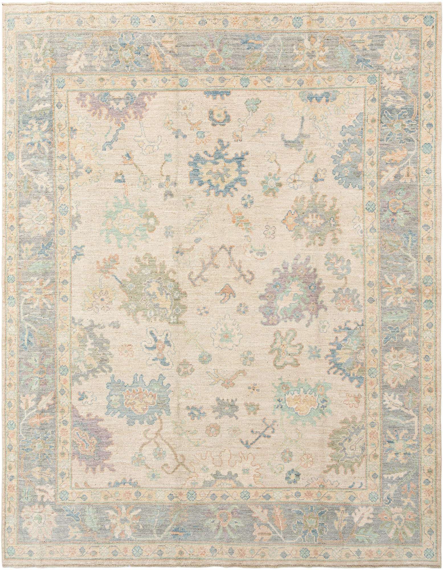 Handmade rectangular Oushak wool rug in ivory with a muted Persian floral pattern and a blue-grey border.