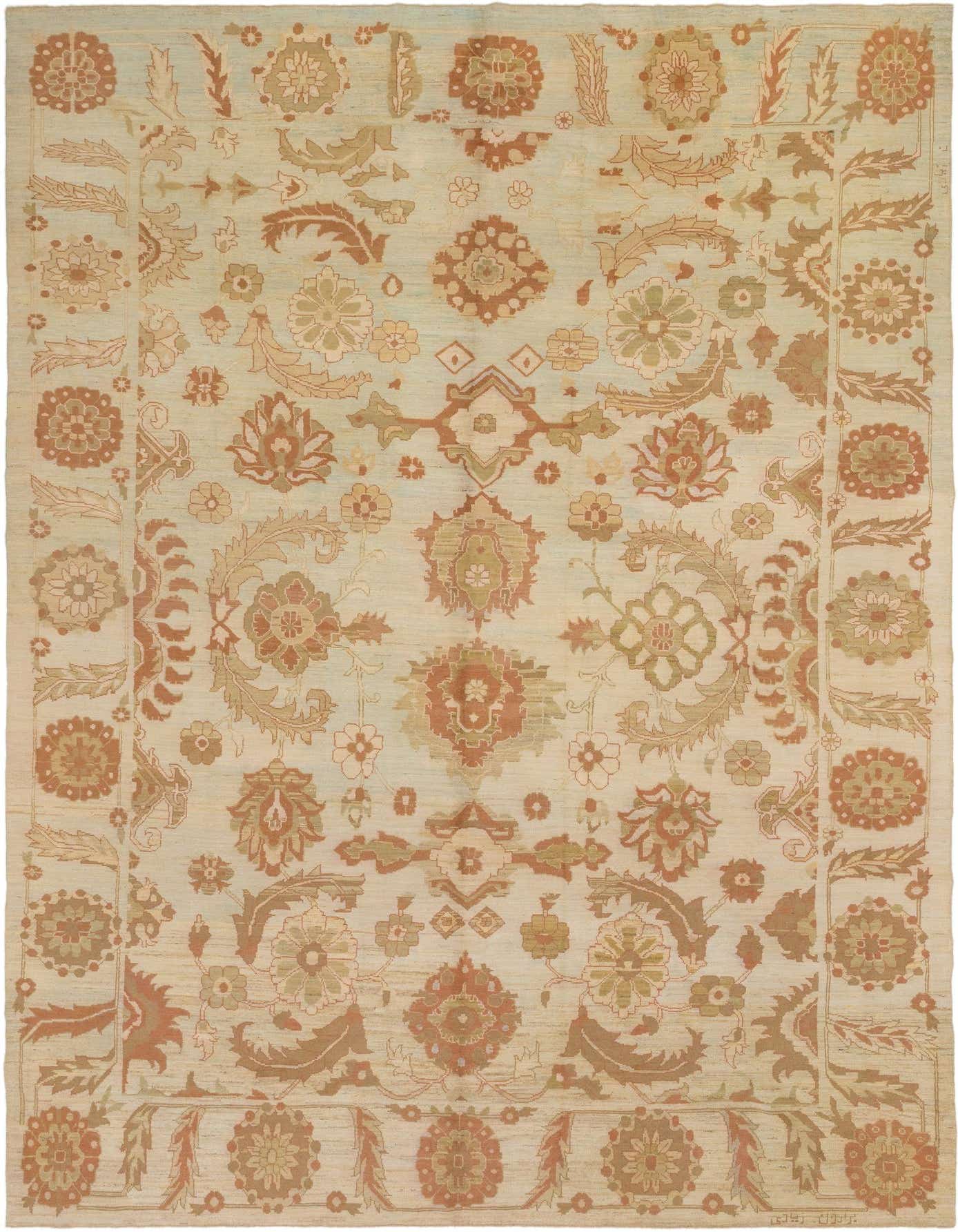 A large 13x18 rectangular ivory Oushak rug with a transitional floral and tribal pattern in muted creams, browns, and greens.