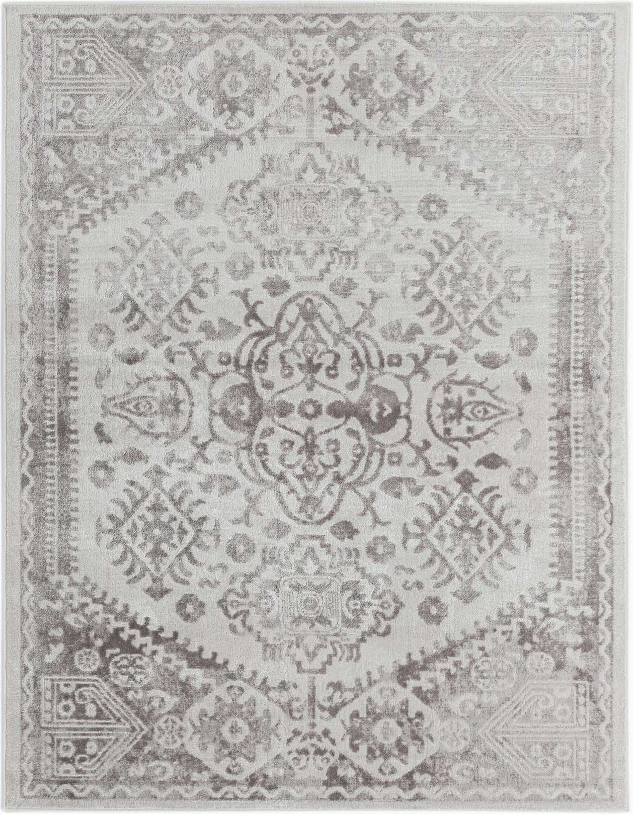 A 5x8 rectangular ivory area rug with a distressed Bohemian medallion and tribal pattern, ideal for a living room.