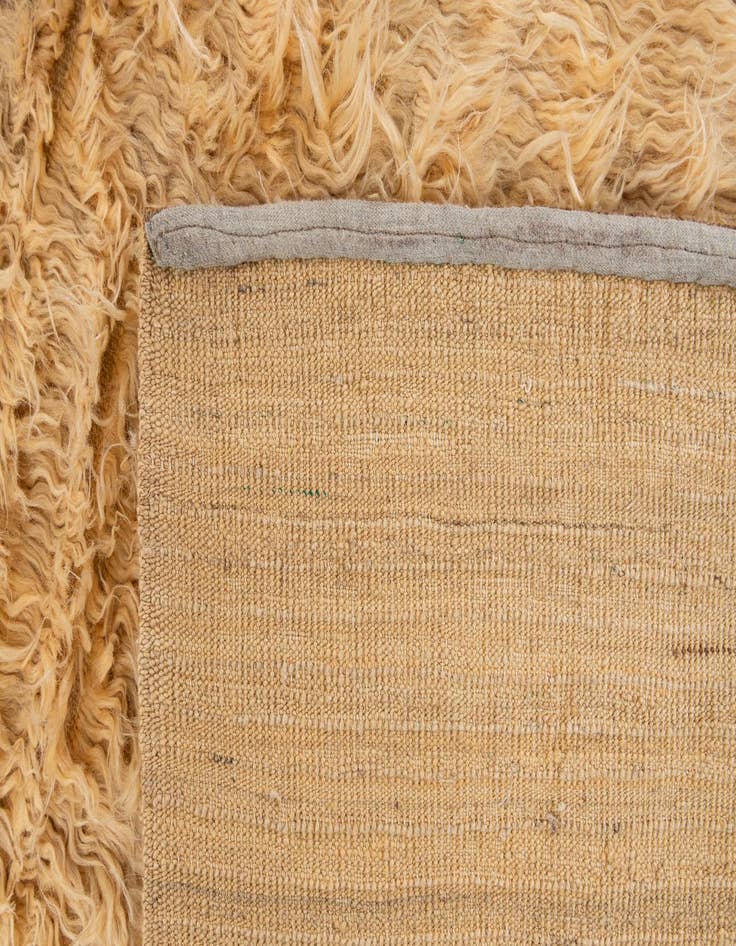 Detail image of  6' 7 x 9' 7  Hand Knotted Solid Shag Wool Rug