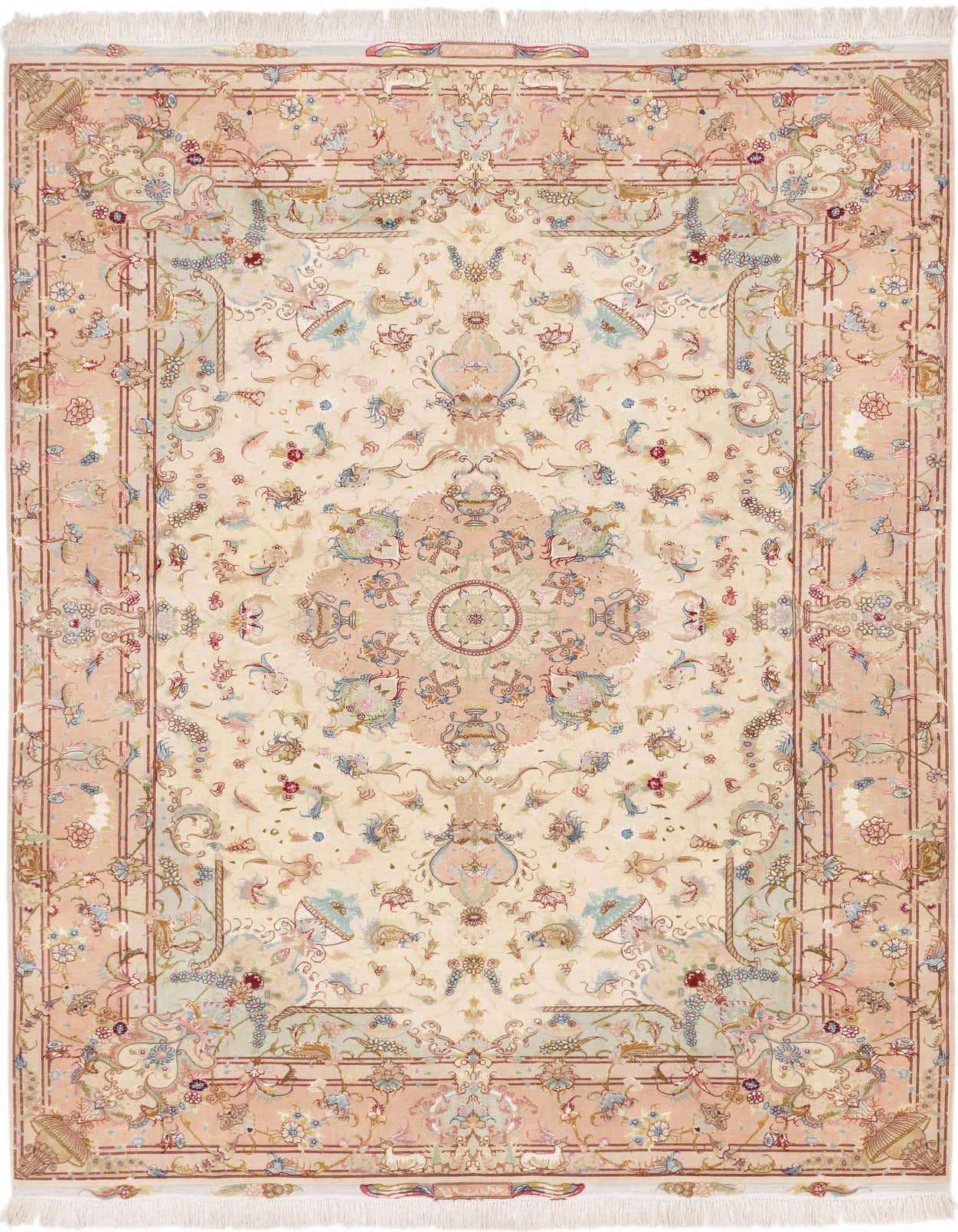 A 6x9 rectangular ivory Persian rug with a detailed botanical medallion pattern and a soft pink border, handmade from silk and kork.