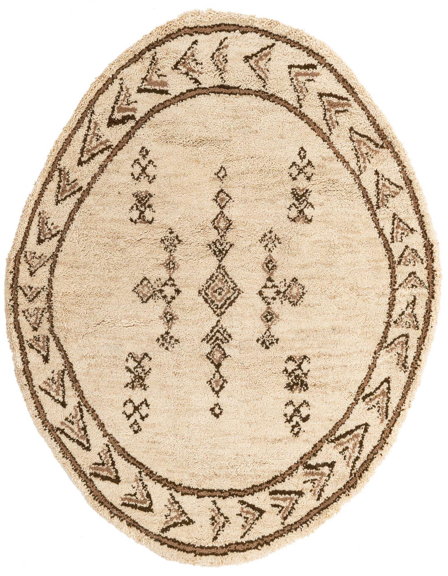 A round ivory shag rug with a brown tribal border and geometric patterns in the center, suitable for a living room.