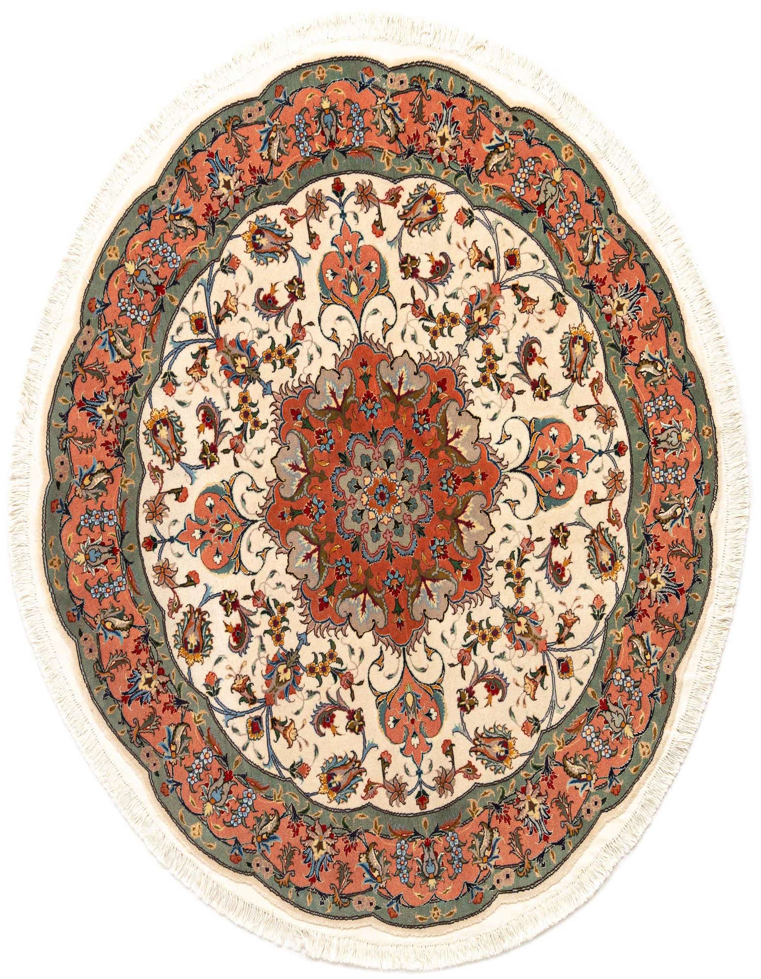 A round 4' 11" ivory Persian Tabriz rug with a central medallion and intricate floral patterns in coral, blue, and green, featuring a fringed edge.