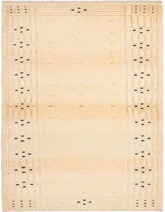 A 10 ft Darya runner rug in ivory wool with a modern oriental pattern, featuring dark geometric accents along the borders.