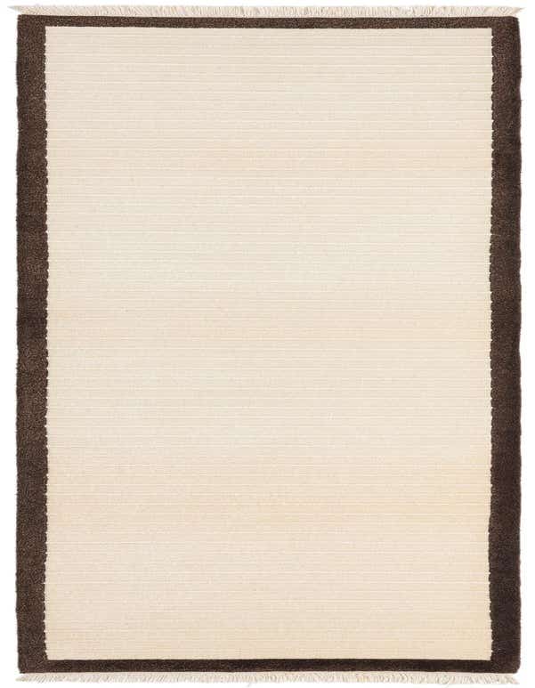 A 10 ft Darya runner rug in ivory with a dark brown border and fringe, featuring a subtle striped texture.