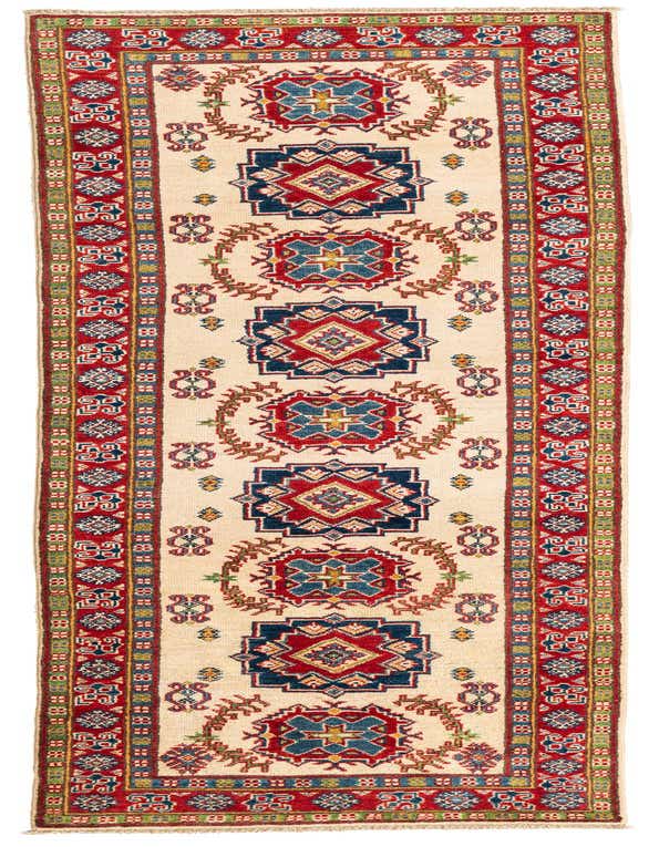 A 10 ft runner rug in traditional Southwestern style, featuring a cream background with red, blue, and green geometric patterns.